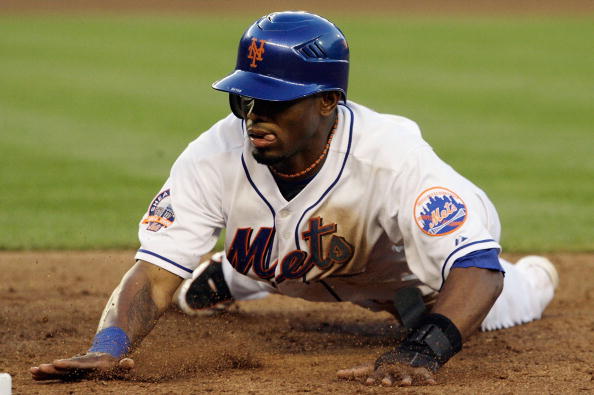 NEW YORK - JUNE 11: Jose Reyes #7 of the New York Mets dives back to first base against the Arizona Diamonbacks on June 11, 2008 at Shea Stadium in the Flushing neighborhood of the Queens borough of New York City. (Photo by Jim McIsaac/Getty Images)