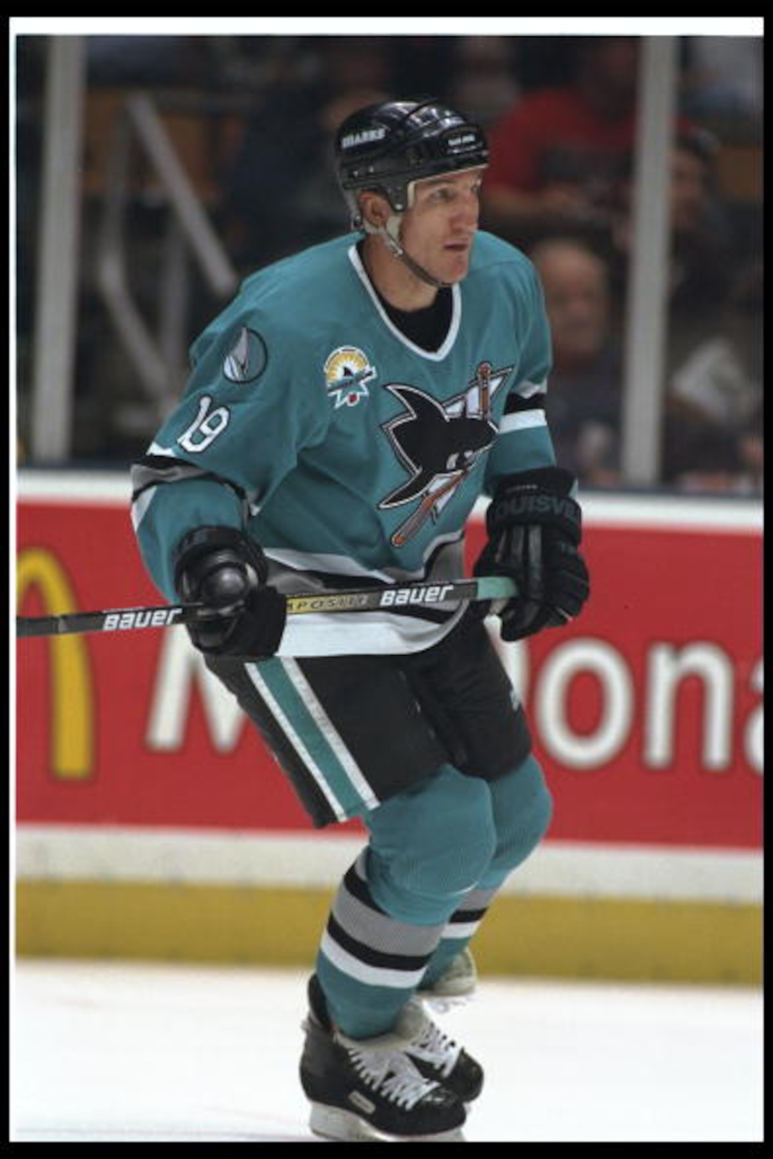24 Oct 1996: Leftwinger Tim Hunter of the San Jose Sharks moves down the ice during a game against the New Jersey Devils at the Continental Airlines Arena in East Rutherford, New Jersey. The Devils won the game, 3-1.