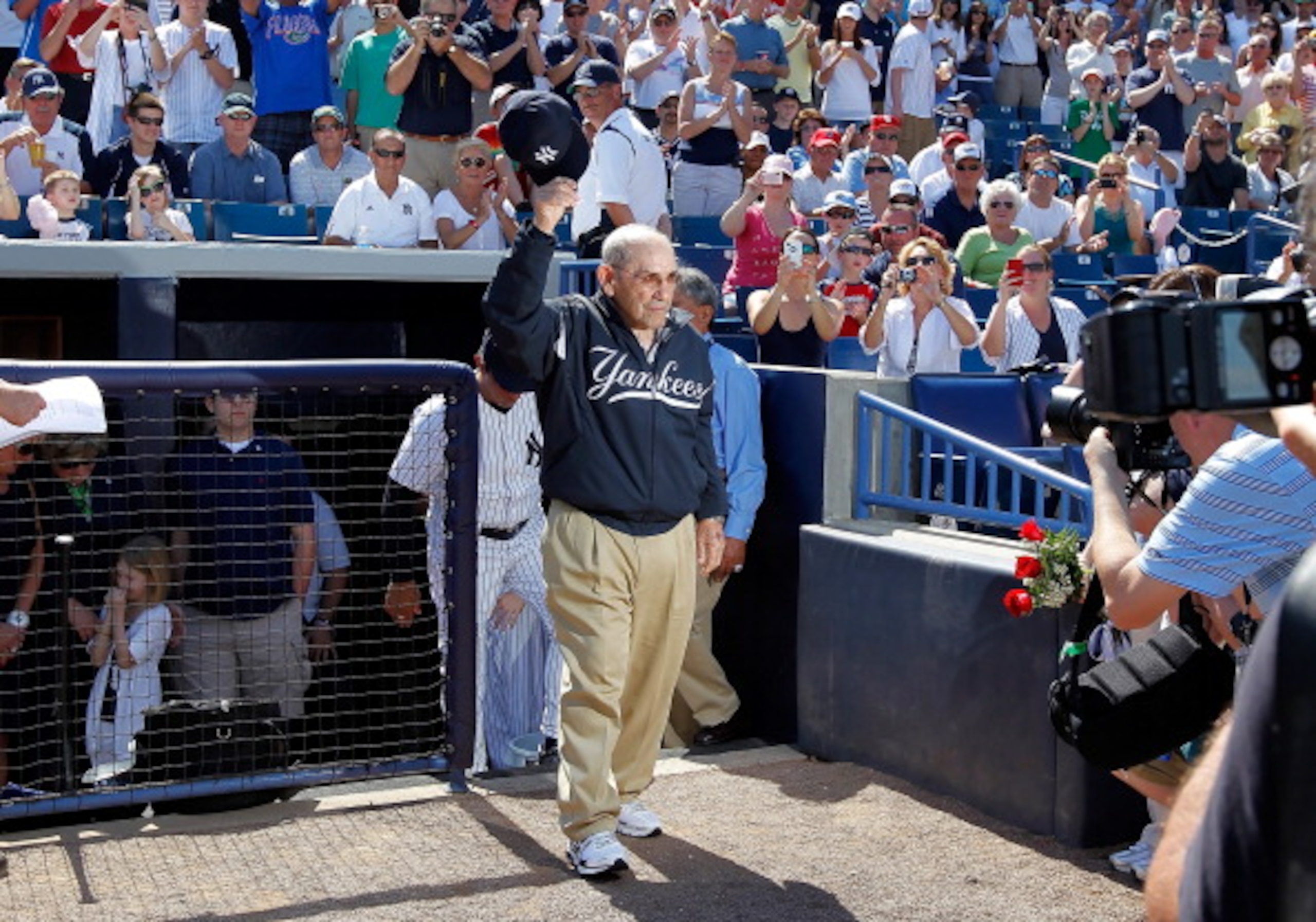 TAMPA, FL - FEBRUARY 26: Hall of Famer Yogi Berra of the New York Yankees tips his hat to the crowd as he is announced just prior to the start of the Grapefruit League Spring Training Game against the Philadelphia Phillies at George M. Steinbrenner Field TAMPA, FL - FEBRUARY 26: Hall of Famer Yogi Berra of the New York Yankees tips his hat to the crowd as he is announced just prior to the start of the Grapefruit League Spring Training Game against the Philadelphia Phillies at George M. Steinbrenner Field