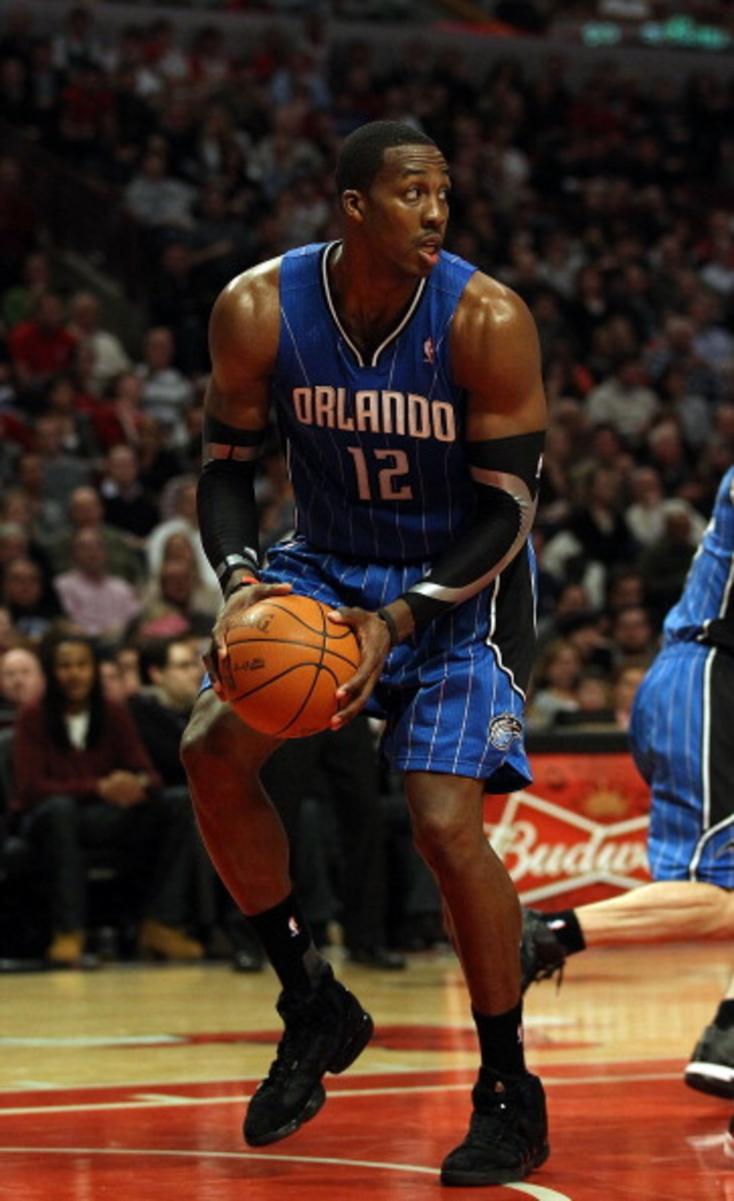 CHICAGO, IL - JANUARY 28: Dwight Howard #12 of the Orlando Magic looks to pass after grabbing a rebound against the Chicago Bulls at the United Center on January 28, 2011 in Chicago, Illinois. The Bulls defeated the Magic 99-90. NOTE TO USER: User express CHICAGO, IL - JANUARY 28: Dwight Howard #12 of the Orlando Magic looks to pass after grabbing a rebound against the Chicago Bulls at the United Center on January 28, 2011 in Chicago, Illinois. The Bulls defeated the Magic 99-90. NOTE TO USER: User express