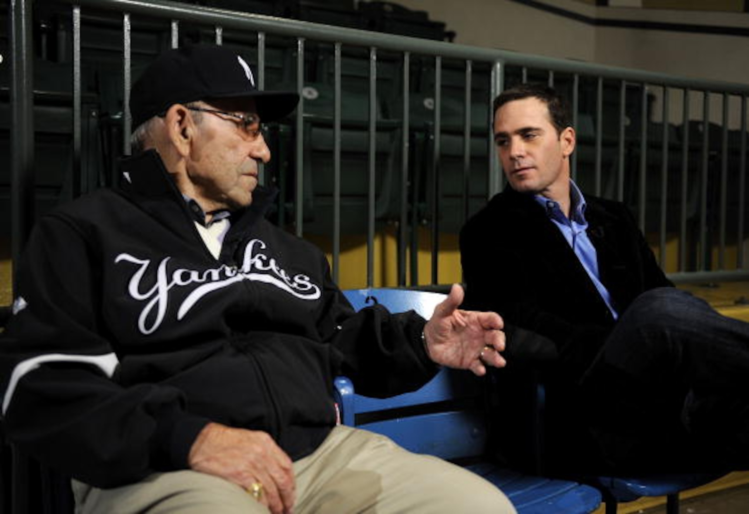 LITTLE FALLS, NJ - NOVEMBER 23: Baseball Hall of Famer Yogi Berra and four-time Nascar champion Jimmie Johnson chat in the theater at the Yogi Berra Museum and and Learning Center on November 23, 2009 in Little Falls, New Jersey. (Photo by Jeff Zelevans LITTLE FALLS, NJ - NOVEMBER 23: Baseball Hall of Famer Yogi Berra and four-time Nascar champion Jimmie Johnson chat in the theater at the Yogi Berra Museum and and Learning Center on November 23, 2009 in Little Falls, New Jersey. (Photo by Jeff Zelevans