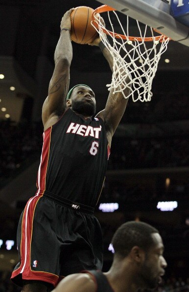 NEWARK, NJ - APRIL 03:  LeBron James #6 of the Miami Heat dunks against the New Jersey Nets at the Prudential Center on April 3, 2011 in Newark, New Jersey.NOTE TO USER: User expressly acknowledges and agrees that, by downloading and/or using this Photogr