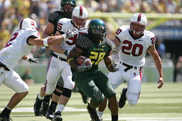 EUGENE, OR - SEPTEMBER 2:  Running back Jonathan Stewart #28 of the Oregon Ducks runs with the ball during the game against the Stanford Cardinal on September 2, 2006 at Autzen Stadium in Eugene, Oregon. The Ducks won 48-10.  (Photo by Jonathan Ferrey/Get