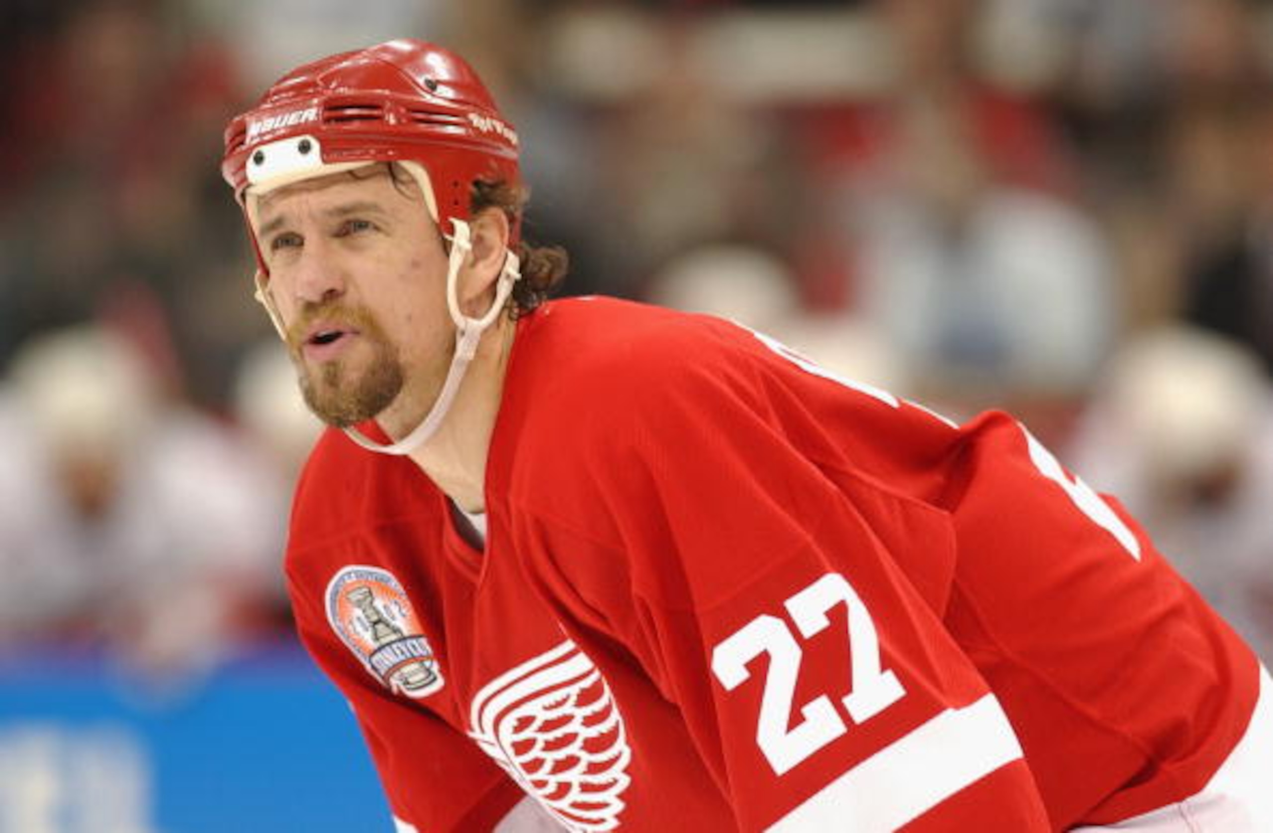 RALEIGH, NC - JUNE 8: Defenseman Fredrik Olausson #27 of the Detroit Red Wings looks on against the Carolina Hurricanes during game three of the NHL Stanley Cup Finals at the Entertainment and Sports Arena in Raleigh, North Carolina on June 8, 2002. The RALEIGH, NC - JUNE 8: Defenseman Fredrik Olausson #27 of the Detroit Red Wings looks on against the Carolina Hurricanes during game three of the NHL Stanley Cup Finals at the Entertainment and Sports Arena in Raleigh, North Carolina on June 8, 2002. The