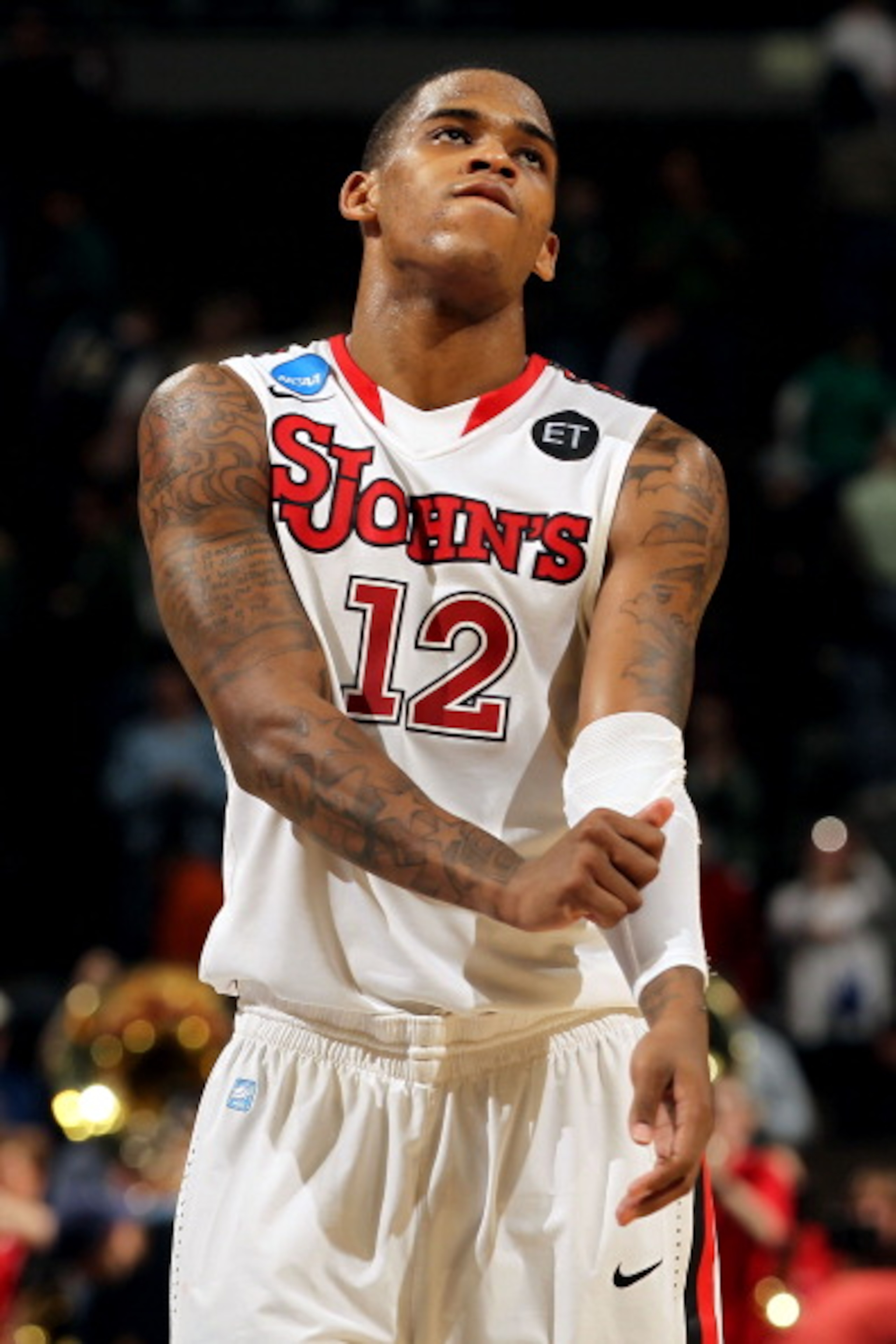 DENVER, CO - MARCH 17:  Dwight Hardy #12 of the St. John's Red Storm reacts against the Gonzaga Bulldogs during the second round of the 2011 NCAA men's basketball tournament at Pepsi Center on March 17, 2011 in Denver, Colorado.  (Photo by Doug Pensinger/