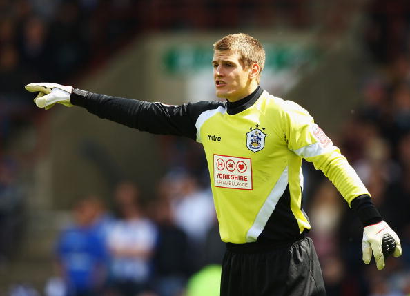 HUDDERSFIELD, ENGLAND - MAY 15:  Alex Smithies of Huddersfield Town in action during the Coca-Cola League One Playoff Semi Final 1st Leg match between Huddersfield Town and Millwall at the Galpharm Stadium on May 15, 2010 in Huddersfield, England.  (Photo