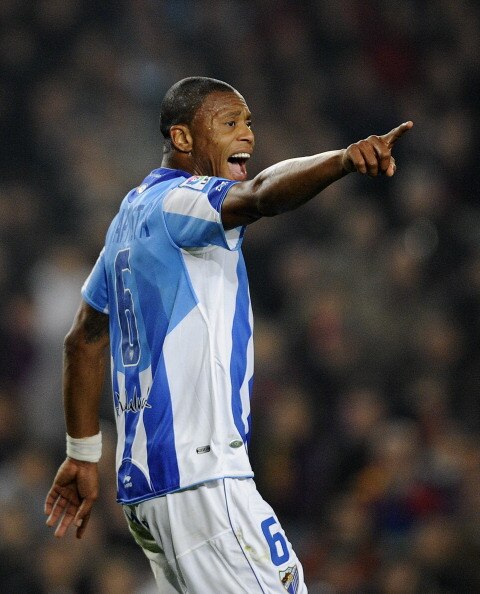 BARCELONA, SPAIN - JANUARY 16:  Julio Baptista of Malaga reacts during the La Liga match between FC Barcelona and Malaga at Nou Camp on January 16, 2011 in Barcelona, Spain. Barcelona won 4-1.  (Photo by David Ramos/Getty Images)