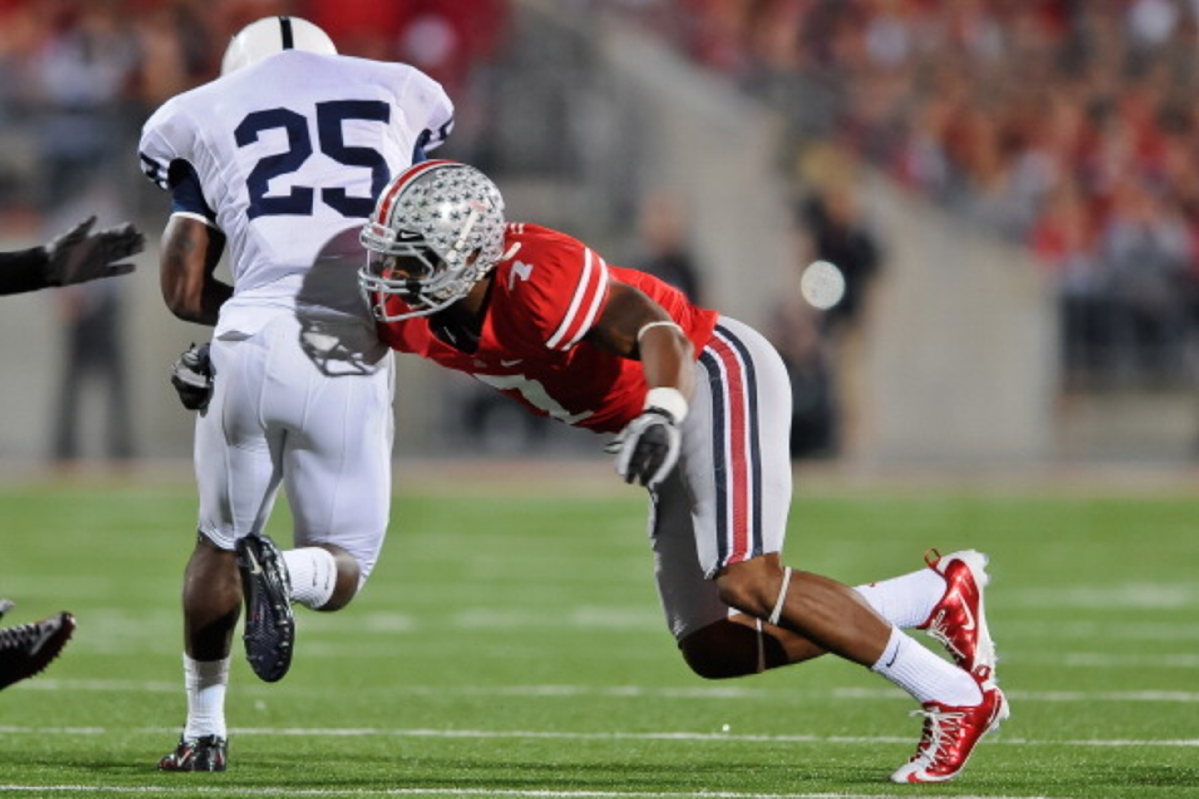 COLUMBUS, OH - NOVEMBER 13: Jermale Hines #7 of the Ohio State Buckeyes tackles Silas Redd #25 of the Penn State Nittany Lions at Ohio Stadium on November 13, 2010 in Columbus, Ohio. (Photo by Jamie Sabau/Getty Images) COLUMBUS, OH - NOVEMBER 13: Jermale Hines #7 of the Ohio State Buckeyes tackles Silas Redd #25 of the Penn State Nittany Lions at Ohio Stadium on November 13, 2010 in Columbus, Ohio. (Photo by Jamie Sabau/Getty Images)