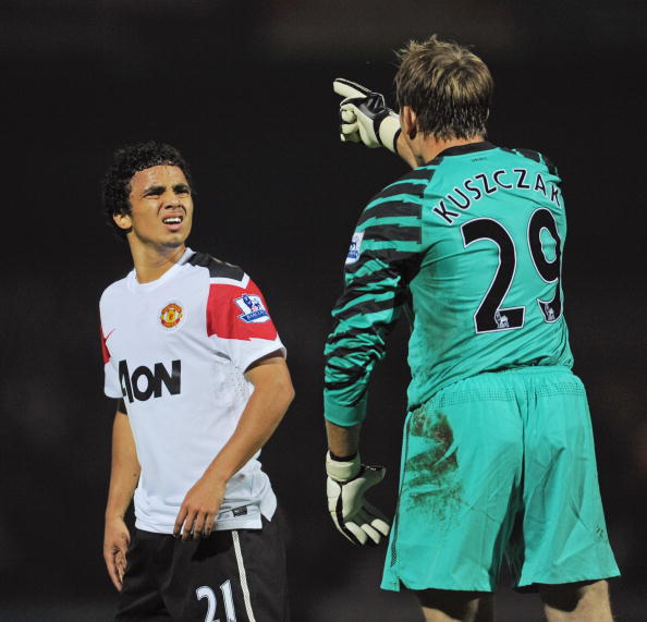 SCUNTHORPE, ENGLAND - SEPTEMBER 22: Tomasz Kuszczak of Manchester United argues with team mate Rafael after conceding the first goal during the Carling Cup 3rd Round match between Scunthorpe United and Manchester United at Glanford Park on September 22, 2