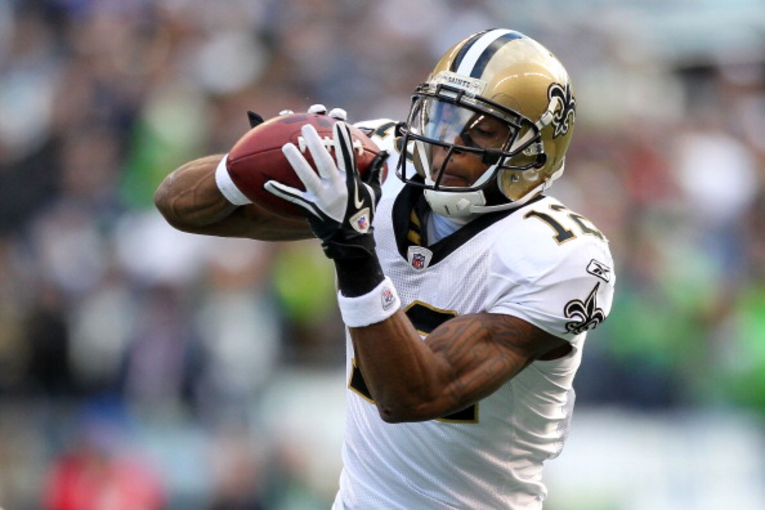 SEATTLE, WA - JANUARY 08: Marques Colston #12 of the New Orleans Saints catches a pass against the Seattle Seahawks during the 2011 NFC wild-card playoff game at Qwest Field on January 8, 2011 in Seattle, Washington. (Photo by Otto Greule Jr/Getty Image SEATTLE, WA - JANUARY 08: Marques Colston #12 of the New Orleans Saints catches a pass against the Seattle Seahawks during the 2011 NFC wild-card playoff game at Qwest Field on January 8, 2011 in Seattle, Washington. (Photo by Otto Greule Jr/Getty Image