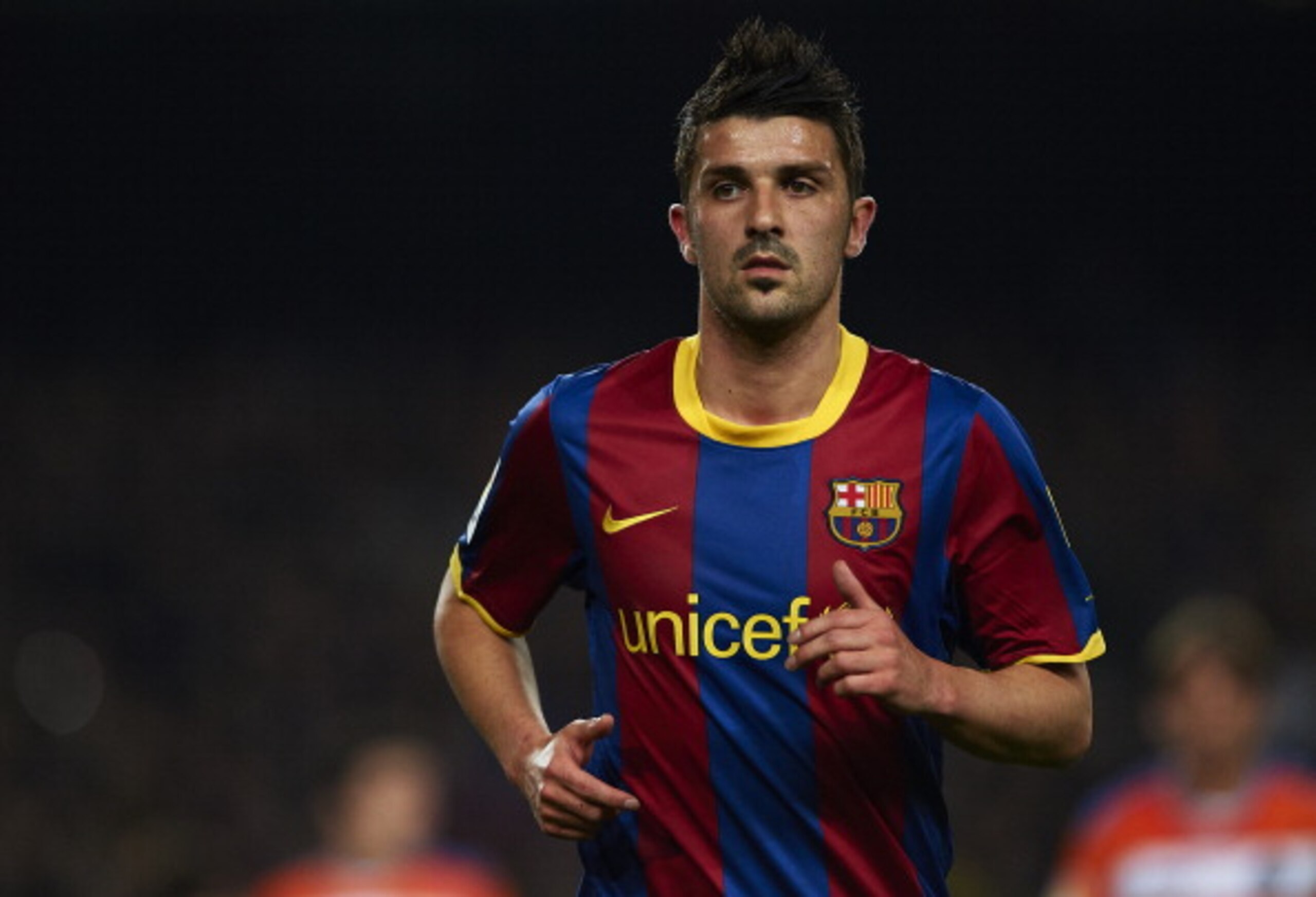 BARCELONA, SPAIN - MARCH 19:  David Villa of Barcelona looks on during the La Liga match between Barcelona and Getafe at Camp Nou on March 19, 2011 in Barcelona, Spain. Barcelona won 2-1.  (Photo by Manuel Queimadelos Alonso/Getty Images)