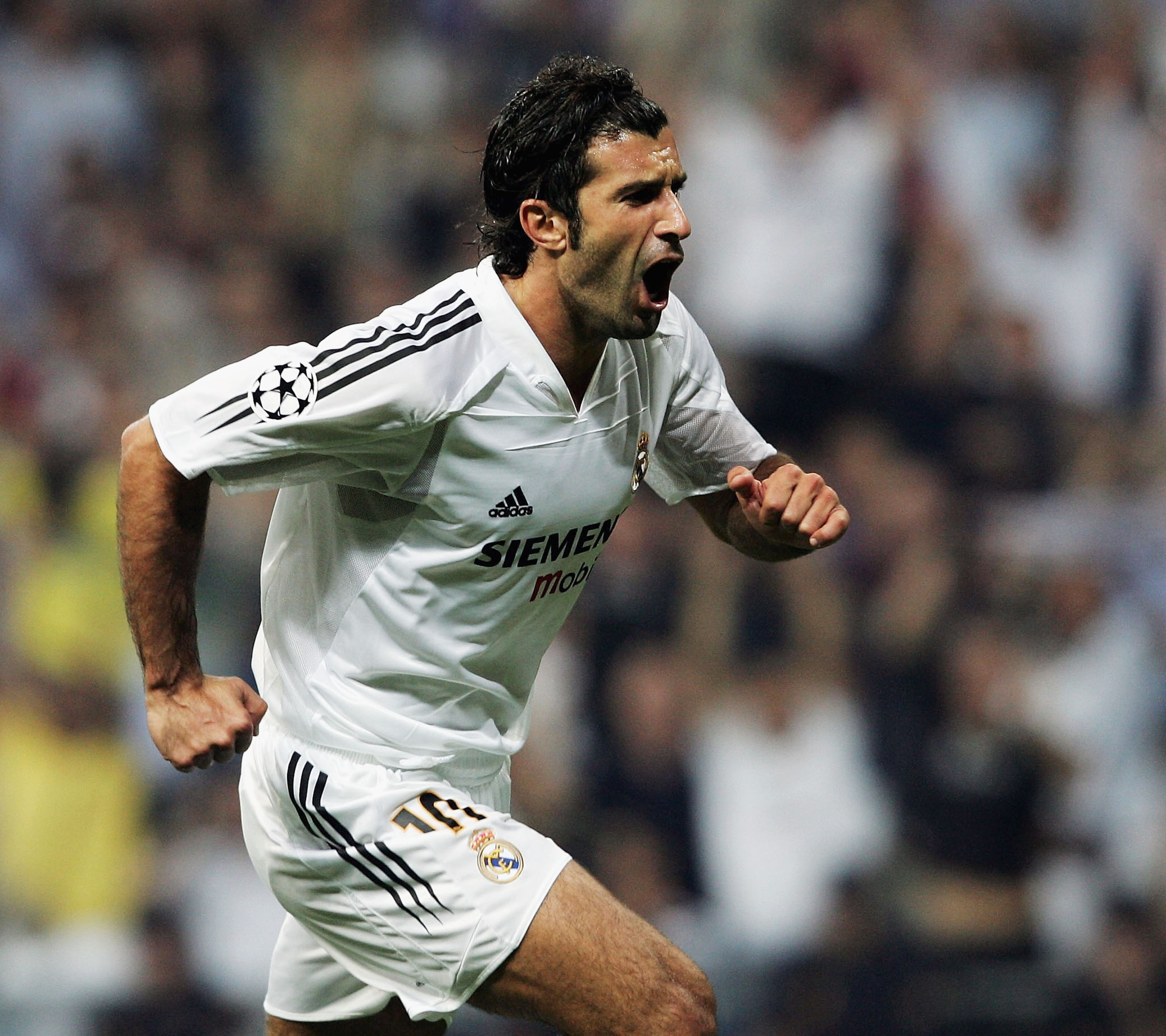 MADRID, SPAIN - SEPTEMBER 28: Luis Figo of Real Madrid celebrates after scorig during the UEFA Champions League Group B match between Real Madrid and Roma at the Santiago Bernabeu Stadium on September 28, 2004 in Madrid, Spain. (Photo by Shaun Botterill MADRID, SPAIN - SEPTEMBER 28: Luis Figo of Real Madrid celebrates after scorig during the UEFA Champions League Group B match between Real Madrid and Roma at the Santiago Bernabeu Stadium on September 28, 2004 in Madrid, Spain. (Photo by Shaun Botterill
