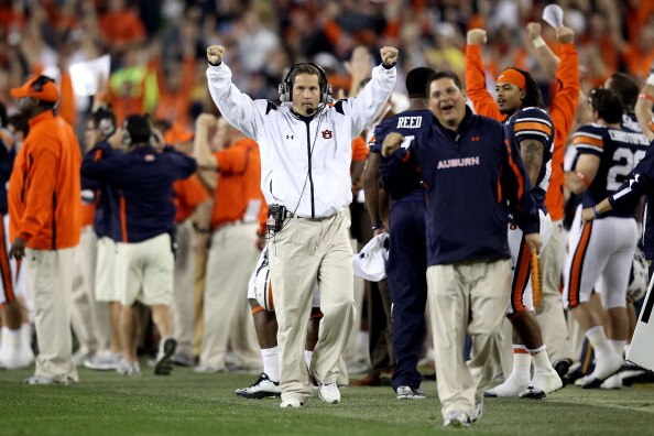 GLENDALE, AZ - JANUARY 10:  Head coach Gene Chizik of the Auburn Tigers reacts after a late fourth-quarter run by Michael Dyer #5 that was ruled he was not down by contact against the Oregon Ducks during the Tostitos BCS National Championship Game at Univ