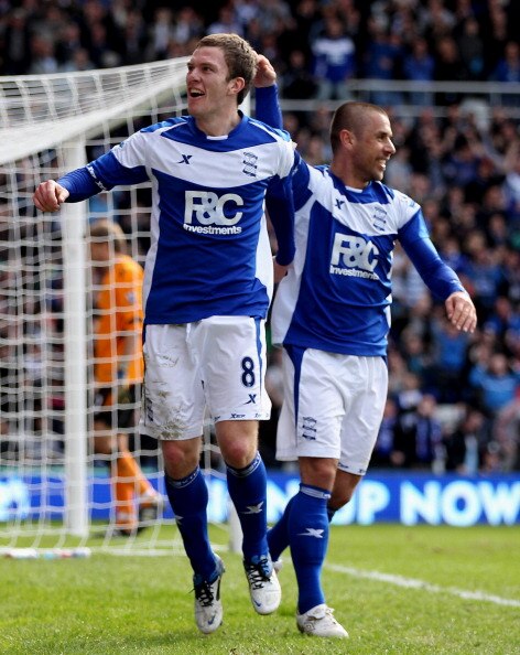 BIRMINGHAM, ENGLAND - APRIL 02:  Craig Gardner of Birmingham celebrates with Kevin Phillips after scoring their second goal during the Barclays Premier League match between Birmingham City and Bolton Wanderers at St.Andrews, on April 2, 2011 in Birmingham