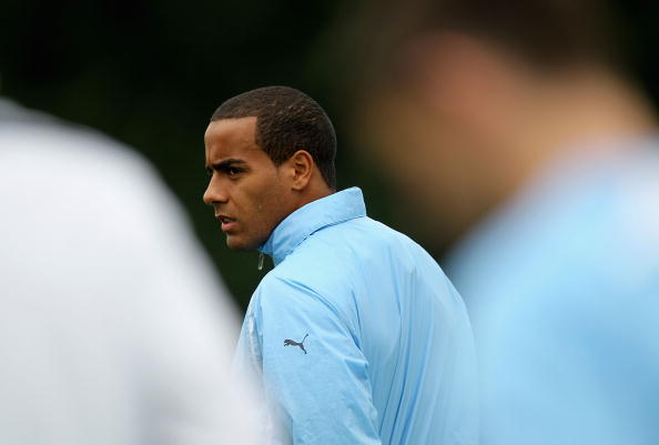 LONDON, ENGLAND - SEPTEMBER 28:  Tom Huddlestone of Tottenham looks on during their training session at Spurs Lodge on September 28, 2010 in London, England.  (Photo by Hamish Blair/Getty Images)