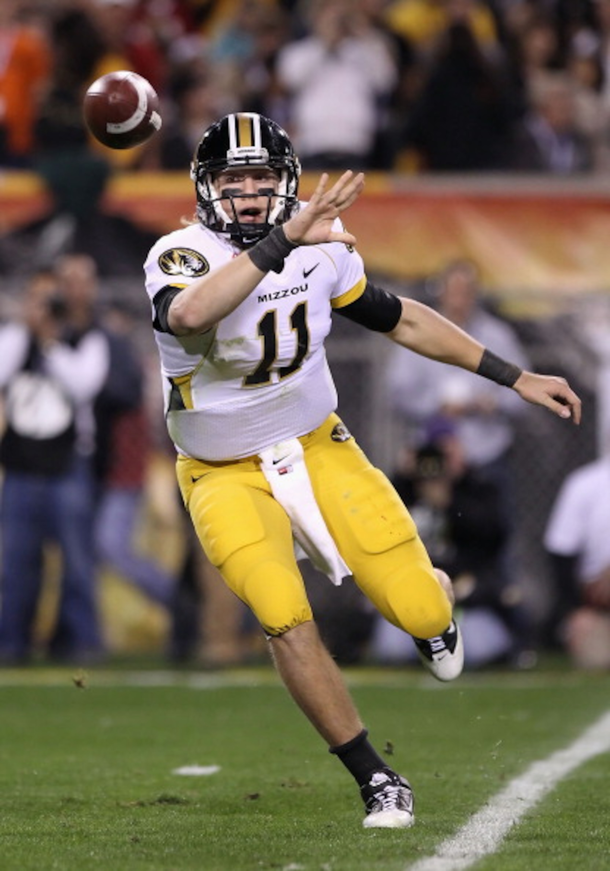 TEMPE, AZ - DECEMBER 28: Quarterback Blaine Gabbert #11 of the Missouri Tigers flips the ball during the Insight Bowl against the Iowa Hawkeyes at Sun Devil Stadium on December 28, 2010 in Tempe, Arizona. (Photo by Christian Petersen/Getty Images) TEMPE, AZ - DECEMBER 28: Quarterback Blaine Gabbert #11 of the Missouri Tigers flips the ball during the Insight Bowl against the Iowa Hawkeyes at Sun Devil Stadium on December 28, 2010 in Tempe, Arizona. (Photo by Christian Petersen/Getty Images)