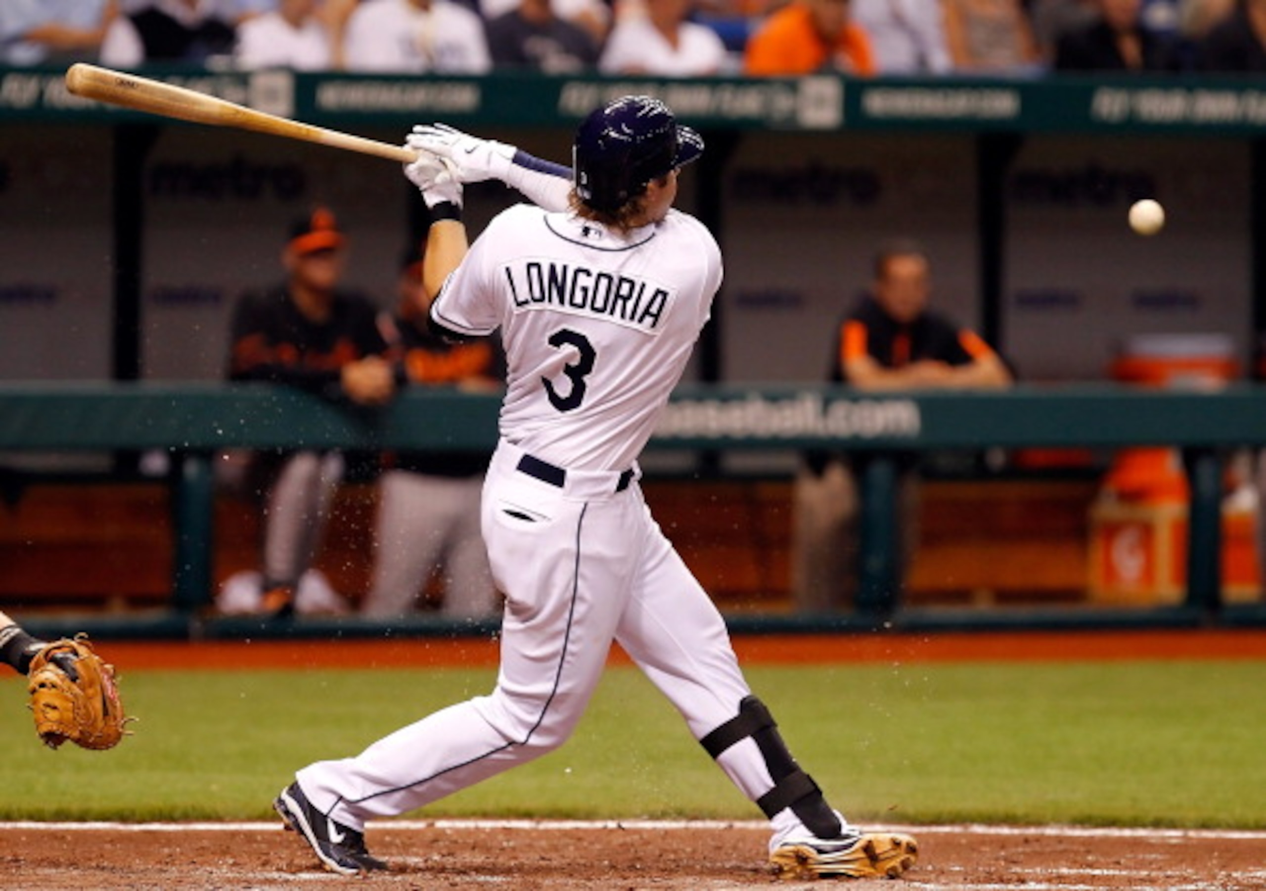 ST. PETERSBURG, FL - APRIL 01:  Infielder Evan Longoria #3 of the Tampa Bay Rays fouls off a pitch against the Baltimore Orioles during the Opening Day game at Tropicana Field on April 1, 2011 in St. Petersburg, Florida.  (Photo by J. Meric/Getty Images)