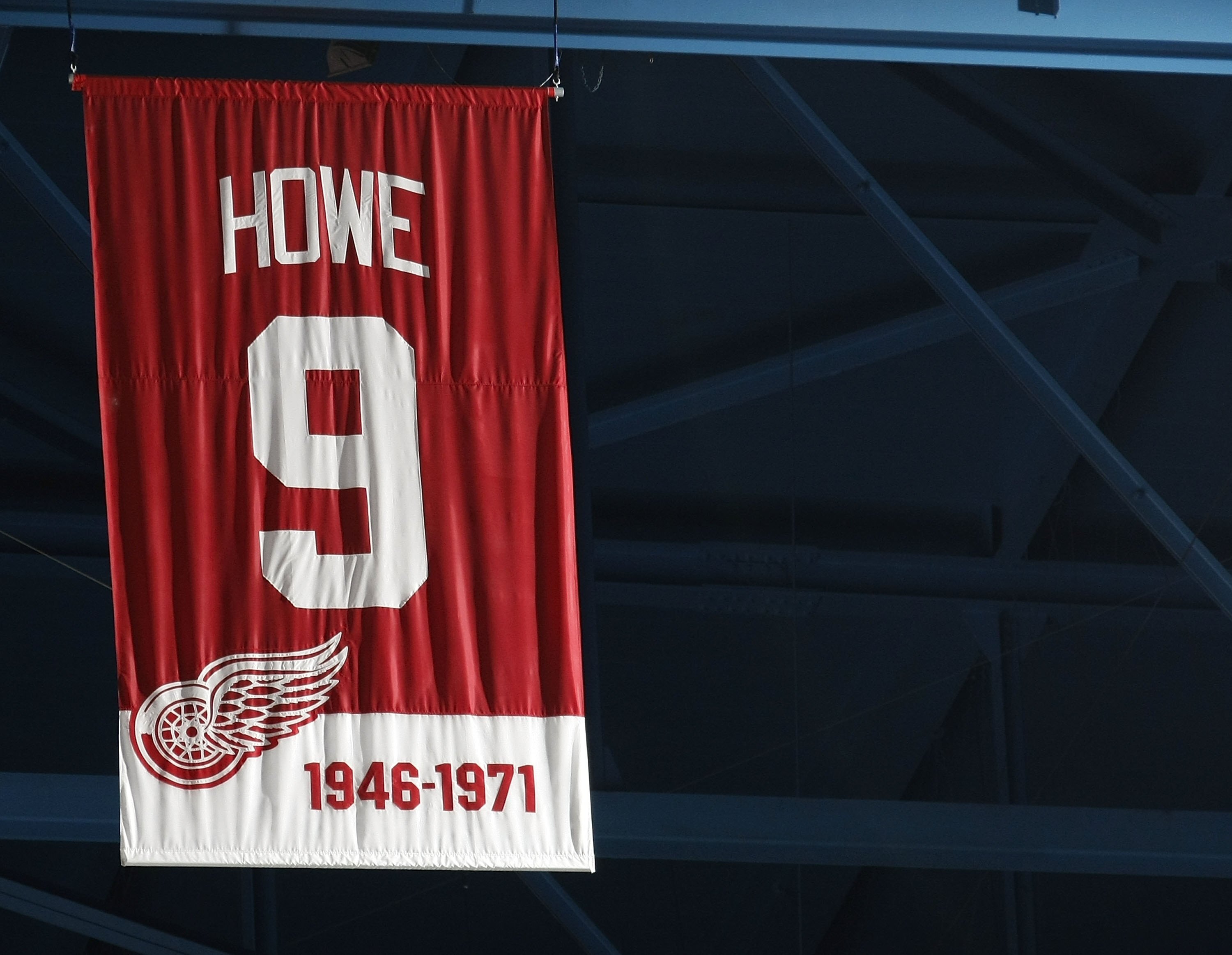 DETROIT - MARCH 11:  The jersey retirement banner for Gordie Howe #9 of the Detroit Red Wings (1946-1971) hangs in the rafters during a game against the Minnesota Wild on March 11, 2010 at Joe Louis Arena in Detroit, Michigan.  (Photo by Gregory Shamus/Ge