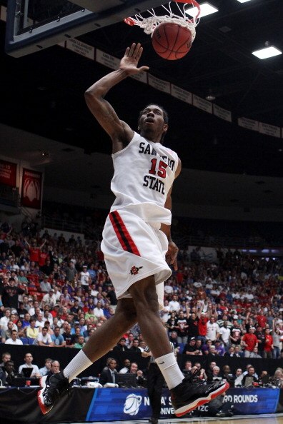 TUCSON, AZ - MARCH 19:  Kawhi Leonard #15 of the San Diego State Aztecs dunks against the Temple Owls during the third round of the 2011 NCAA men's basketball tournament at McKale Center on March 19, 2011 in Tucson, Arizona.  (Photo by Christian Petersen/