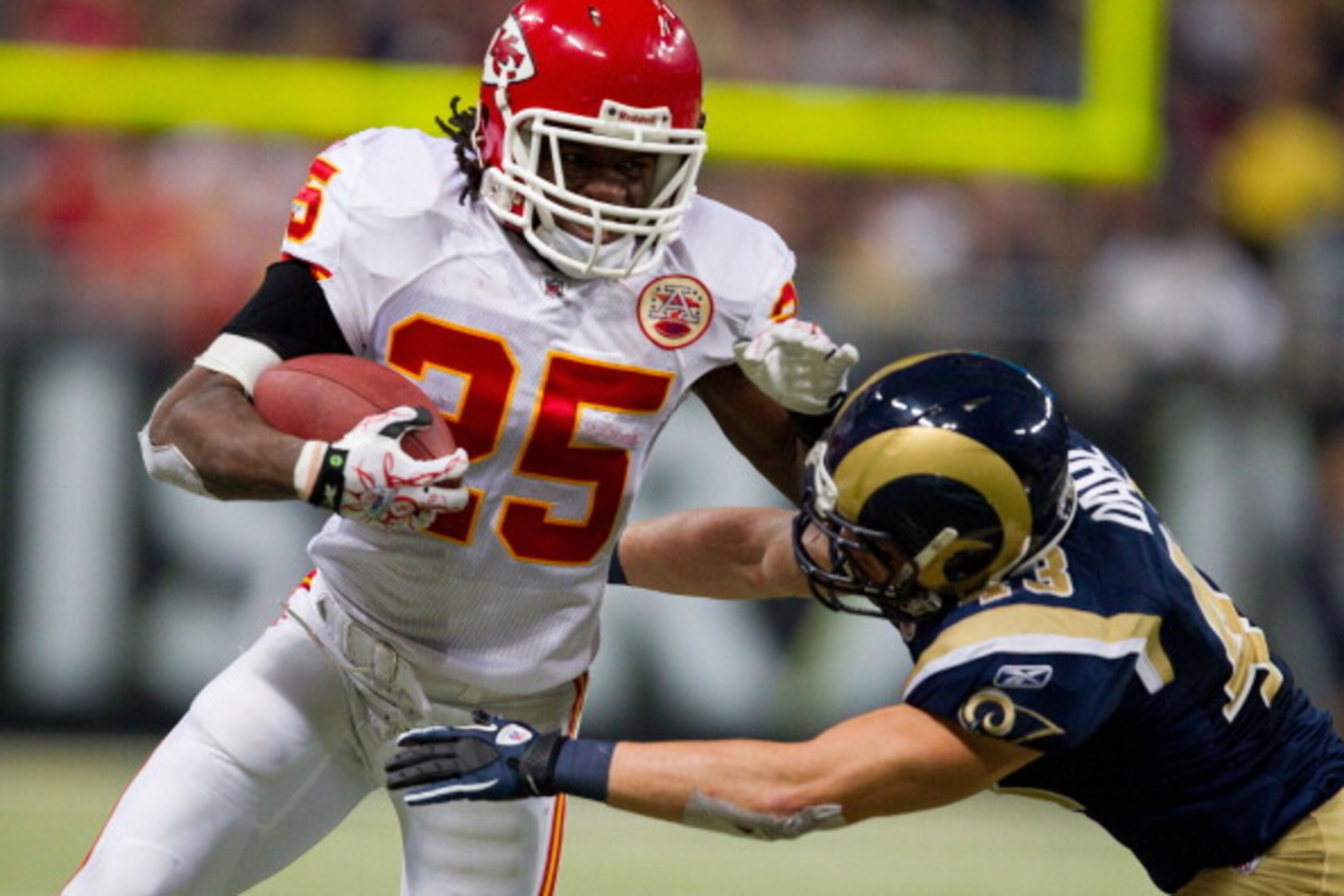 ST. LOUIS, MO - DECEMBER 19: Jamaal Charles #25 of the Kansas City Chiefs looks to get by Craig Dahl #43 of the St. Louis Rams at the Edward Jones Dome on December 19, 2010 in St. Louis, Missouri. The Chiefs beat the Rams 27-13. (Photo by Dilip Vishwana ST. LOUIS, MO - DECEMBER 19: Jamaal Charles #25 of the Kansas City Chiefs looks to get by Craig Dahl #43 of the St. Louis Rams at the Edward Jones Dome on December 19, 2010 in St. Louis, Missouri. The Chiefs beat the Rams 27-13. (Photo by Dilip Vishwana