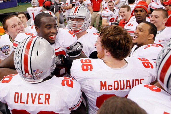 NEW ORLEANS, LA - JANUARY 04:  (L) Solomon Thomas #98 of the Ohio State Buckeyes celebrates with his teammates after he intercepts a pass to seal the 31-26 victory for the Buckeyes against the Arkansas Razorbacks in the Allstate Sugar Bowl at the Louisian