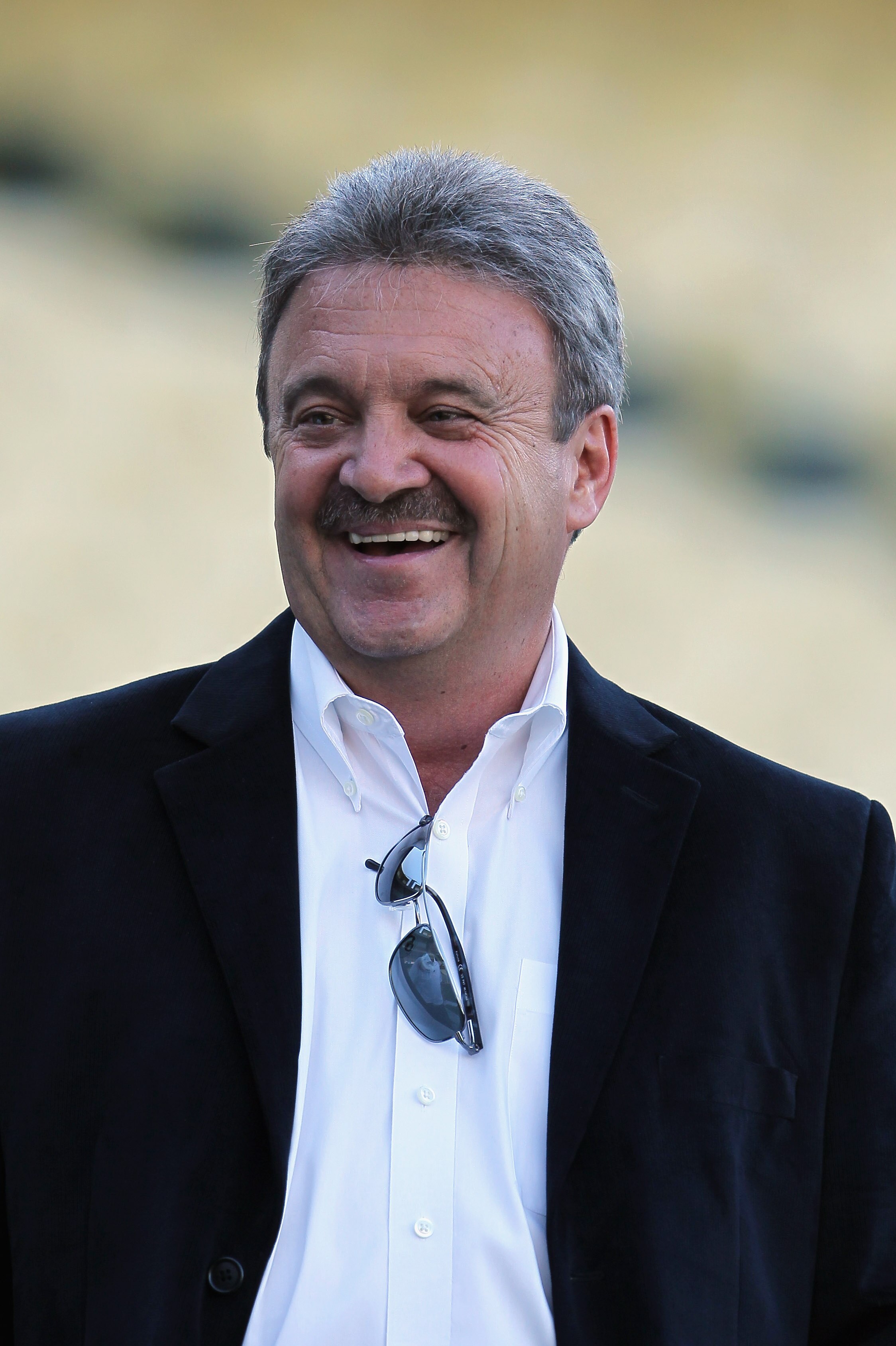 LOS ANGELES, CA - APRIL 01:  Los Angeles Dodgers general manager Ned Colletti looks on prior to the start of the game against the San Francisco Giants at Dodger Stadium on April 1, 2011 in Los Angeles, California.  (Photo by Jeff Gross/Getty Images)