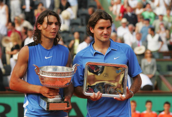 PARIS - JUNE 11:  Rafael Nadal (L) of Spain looks on after defeating Roger Federer (R) of Switzerland during the Men's Singles Final on day fifteen of the French Open at Roland Garros on June 11, 2006 in Paris, France.  (Photo by Matthew Stockman/Getty Im