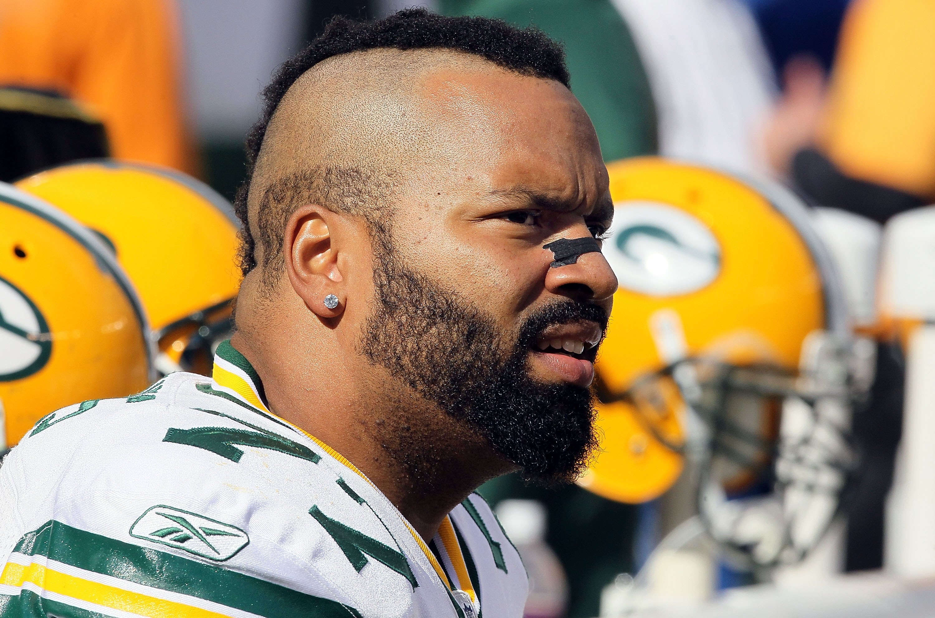 EAST RUTHERFORD, NJ - OCTOBER 31:  Cullen Jenkins #77 of the Green Bay Packers in action against the New York Jets on October 31, 2010 at the New Meadowlands Stadium in East Rutherford, New Jersey.The Packers defeated the Jets 9-0.  (Photo by Jim McIsaac/