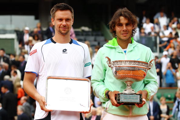 PARIS - JUNE 06:  Rafael Nadal of Spain and Robin Soderling of Sweden pose with their trophies after the men's singles final match between Rafael Nadal of Spain and Robin Soderling of Sweden on day fifteen of the French Open at Roland Garros on June 6, 20