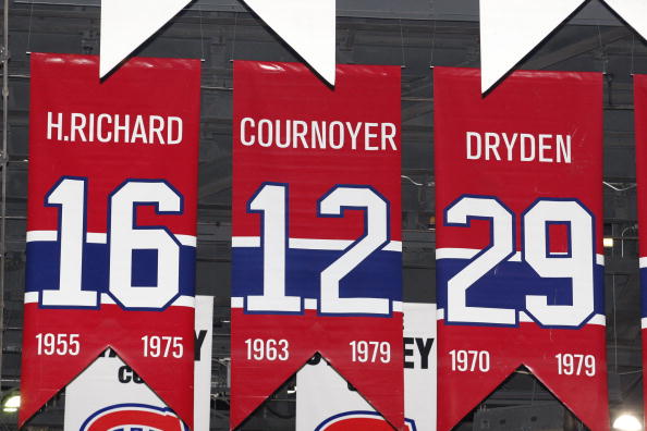MONTREAL- APRIL 19:  A photo of the banners commemorating the retired jerseys of Henri Richard, Yvan Cournoyer and Ken Dryden hanging in the Bell Centre prior to Game Three of the Eastern Conference Quarterfinals between the Washington Capitals and Montre