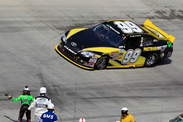 BRISTOL, TN - MARCH 19:  Danica Patrick (L), driver of the #7 GoDaddy.com Chevrolet, gestures to Ryan Truex, driver of the #99 Pastrana Waltrip Racing Toyota, after an incident in the NASCAR Nationwide Series Scotts EZ Seed 300 at Bristol Motor Speedway o