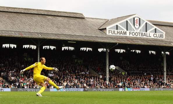 LONDON, ENGLAND - APRIL 03:  Mark Schwarzer of Fulham clears the ball during the Barclays Premier League match between Fulham and Blackpool at Craven Cottage on April 3, 2011 in London, England.  (Photo by Ian Walton/Getty Images)