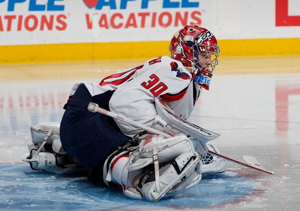 PHILADELPHIA, PA - MARCH 22:  Michal Neuvirth #30 of the Washington Capitals stretches during an NHL hockey game against the Philadelphia Flyers at the Wells Fargo Center on March 22, 2011 in Philadelphia, Pennsylvania.  (Photo by Paul Bereswill/Getty Ima