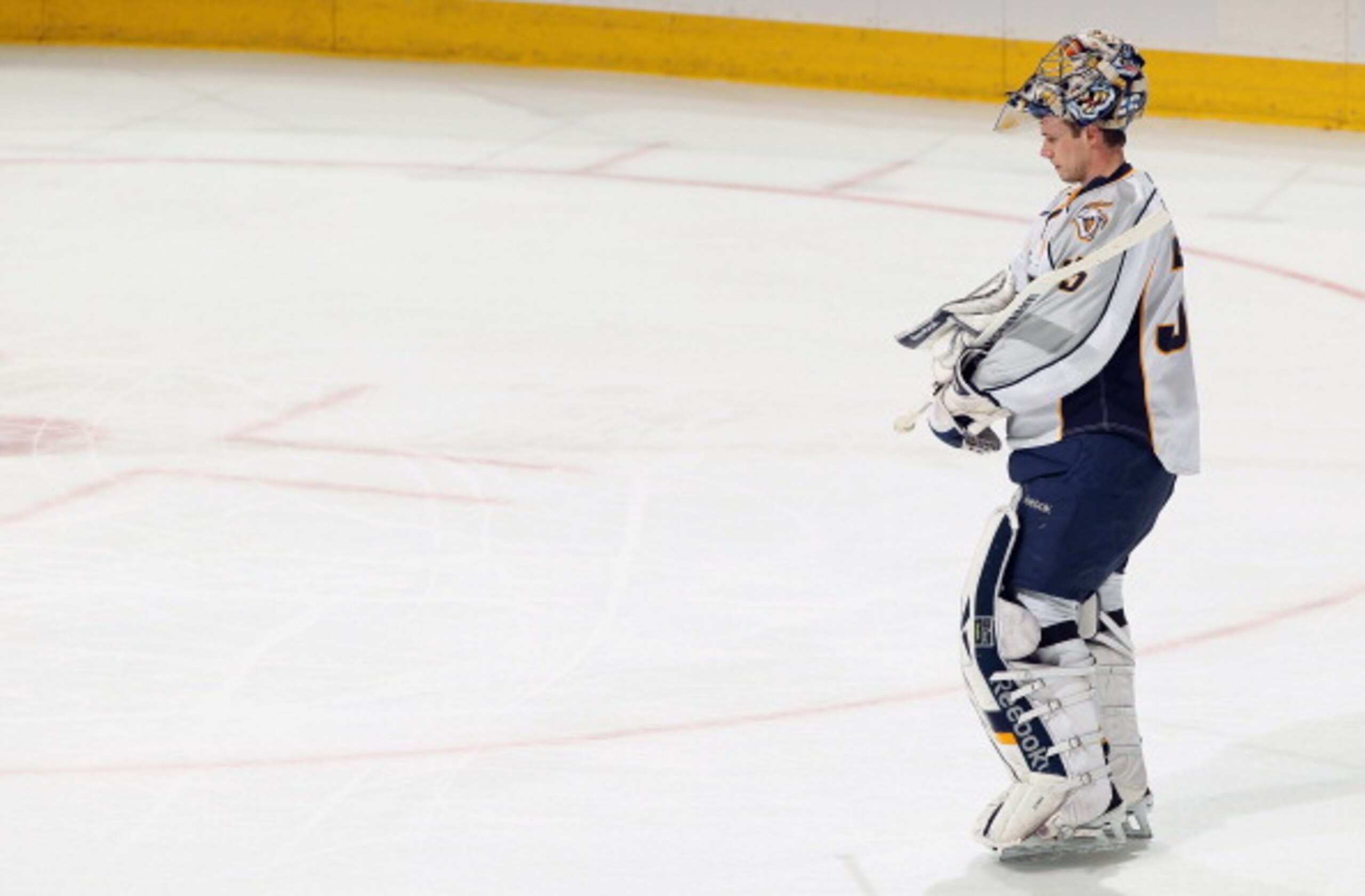 DENVER, CO - MARCH 31:  Goalie Pekka Rinne #35 of the Nashville Predators prepares to defend the goal against the Colorado Avalanche at the Pepsi Center on March 31, 2011 in Denver, Colorado. Rinne had 27 saves as the Nashville Predators defeated the Colo