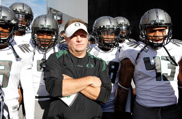 CORVALLIS, OR - DECEMBER 04:  Head Coach Chip Kelly of the Oregon Ducks prepares with his team before the game against the Oregon State Beavers during the 114th Civil War on December 4, 2010 at the Reser Stadium in Corvallis, Oregon.  (Photo by Jonathan F