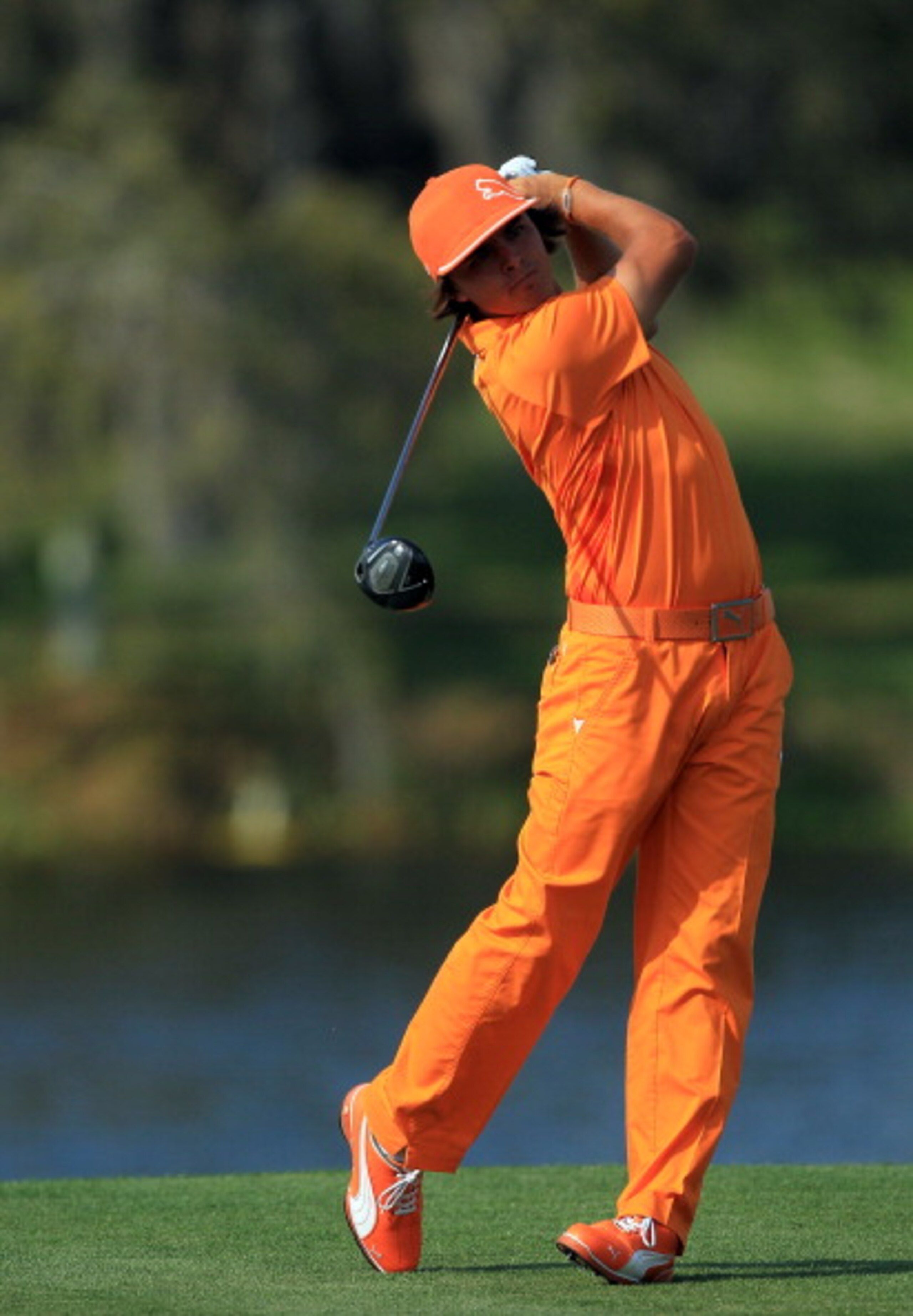 ORLANDO, FL - MARCH 27:  Rickie Fowler of the USA plays his tee shot on the 16th hole during the final round of the 2011 Arnold Palmer Invitational presented by Mastercard at the Bay Hill Lodge and Country Club on March 27, 2011 in Orlando, Florida.  (Pho