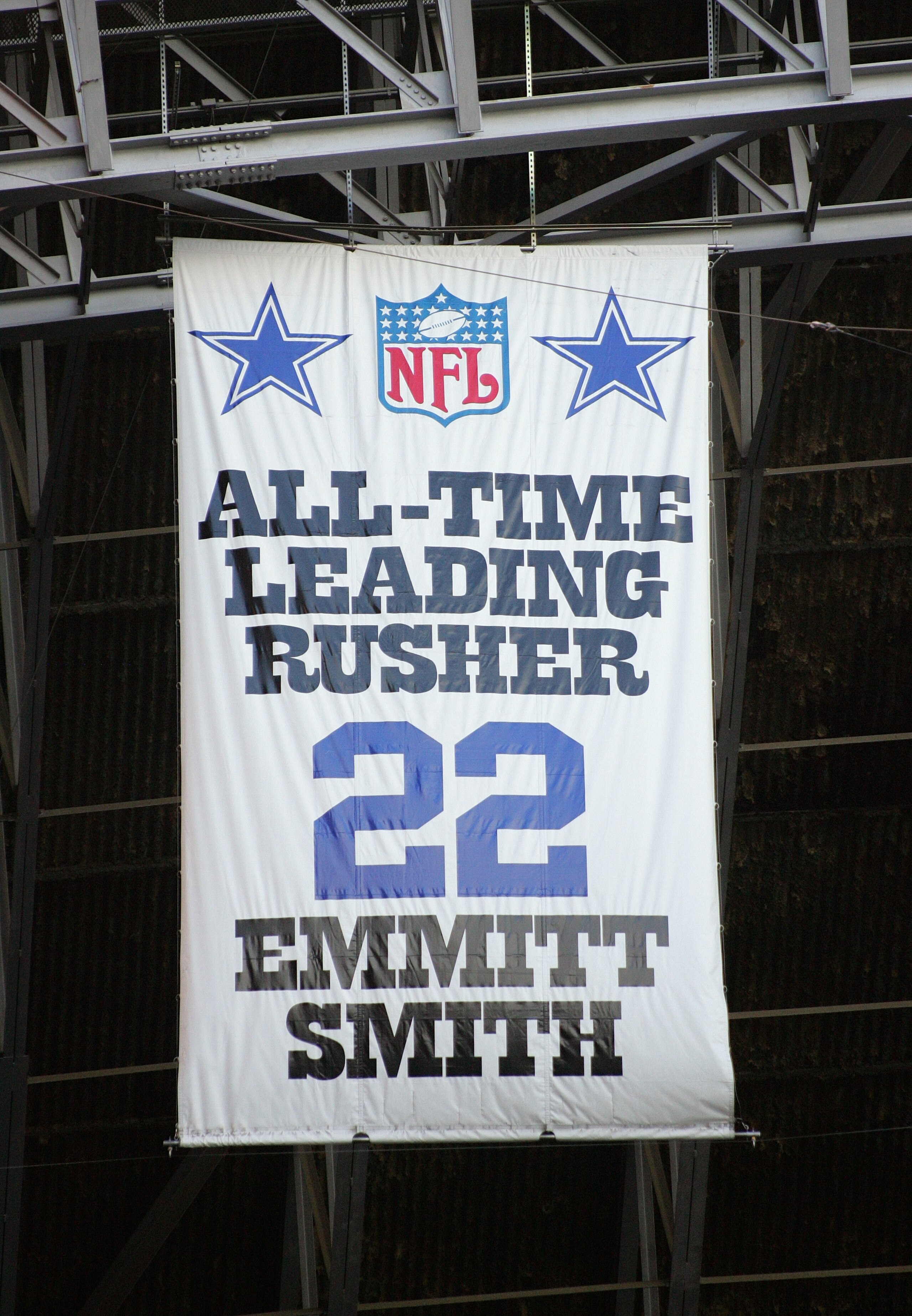 IRVING, TX - NOVEMBER 20: A banner hangs from the rafters commemorating NFL All-Time Leading Rusher and former Dallas Cowboys runningback Emmitt Smith during the game between the Detroit Lions and the Dallas Cowboys on November 20, 2005 at Texas Stadium IRVING, TX - NOVEMBER 20: A banner hangs from the rafters commemorating NFL All-Time Leading Rusher and former Dallas Cowboys runningback Emmitt Smith during the game between the Detroit Lions and the Dallas Cowboys on November 20, 2005 at Texas Stadium