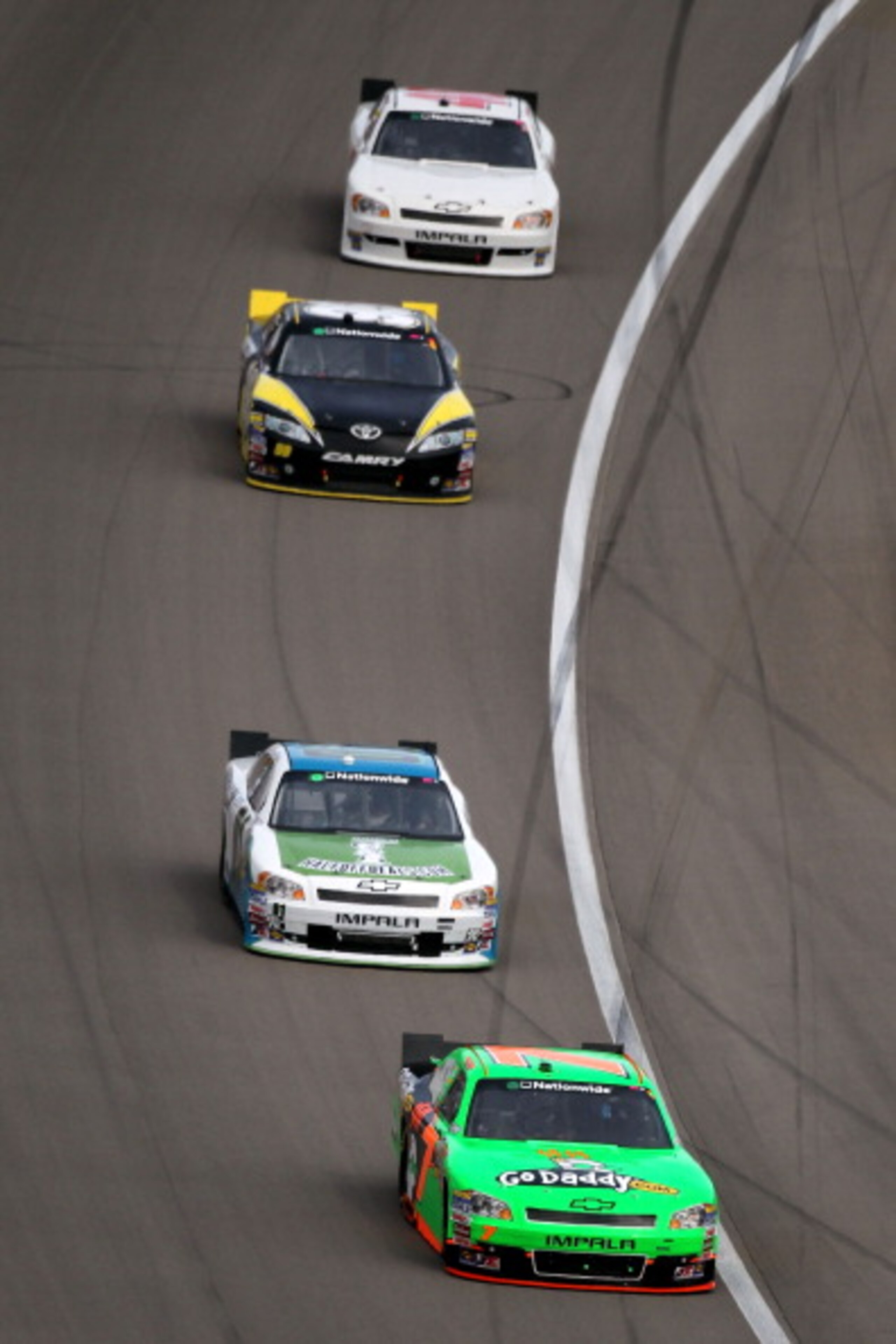LAS VEGAS, NV - MARCH 05:  Danica Patrick, driver of the #7 GoDaddy.com Chevrolet, leads a group of cars during the NASCAR Nationwide Series Sam's Town 300 at Las Vegas Motor Speedway on March 5, 2011 in Las Vegas, Nevada.  (Photo by Jonathan Ferrey/Getty