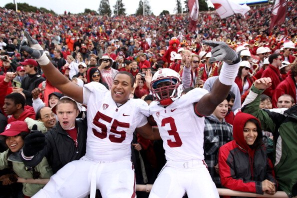 BERKELEY, CA - NOVEMBER 20:  Michael Thomas #3 and Jonathan Martin #55 of the Stanford Cardinal celebrate after beating the California Golden Bears at California Memorial Stadium on November 20, 2010 in Berkeley, California.  (Photo by Ezra Shaw/Getty Ima