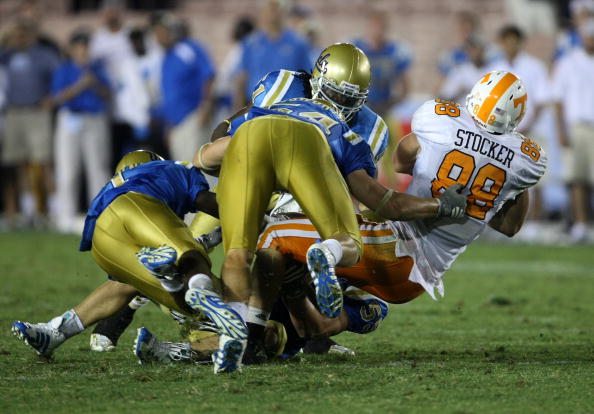 PASADENA, CA - SEPTEMBER 01:  Tight end Luke Stocker #88 of the University of Tennessee Volunteers is tackled by cornerback Alterraun Verner #1 and linebackers Kyle Bosworth #54 and Reggie Carter #51 of the UCLA Bruins on September 1, 2008 at the Rose Bow