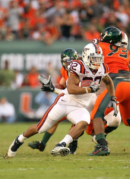 MIAMI - NOVEMBER 20:  Darren Evans #32 of the Virginia Tech Hokies runs for a first down during a game against the Miami Hurricanes at Sun Life Stadium on November 20, 2010 in Miami, Florida.  (Photo by Mike Ehrmann/Getty Images)