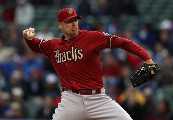 CHICAGO, IL - APRIL 06: J.J. Putz #40 of the Arizona Diamondbacks finishes off the Chicago Cubs in the 9th inning for his second save of the saeson at Wrigley Field on April 6, 2011 in Chicago, Illinois. The Diamondbacks defeated the Cubs 6-4. (Photo by J