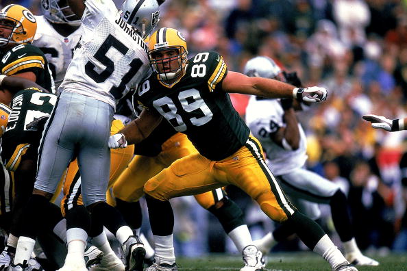 12 Sep 1999: Mark Chmura #89 of the Green Bay Packers moves to tackle during a game against the Oakland Raiders at the Lambeau Field in Green Bay, Wisconsin. The Packers defeated the Raiders 28-24.