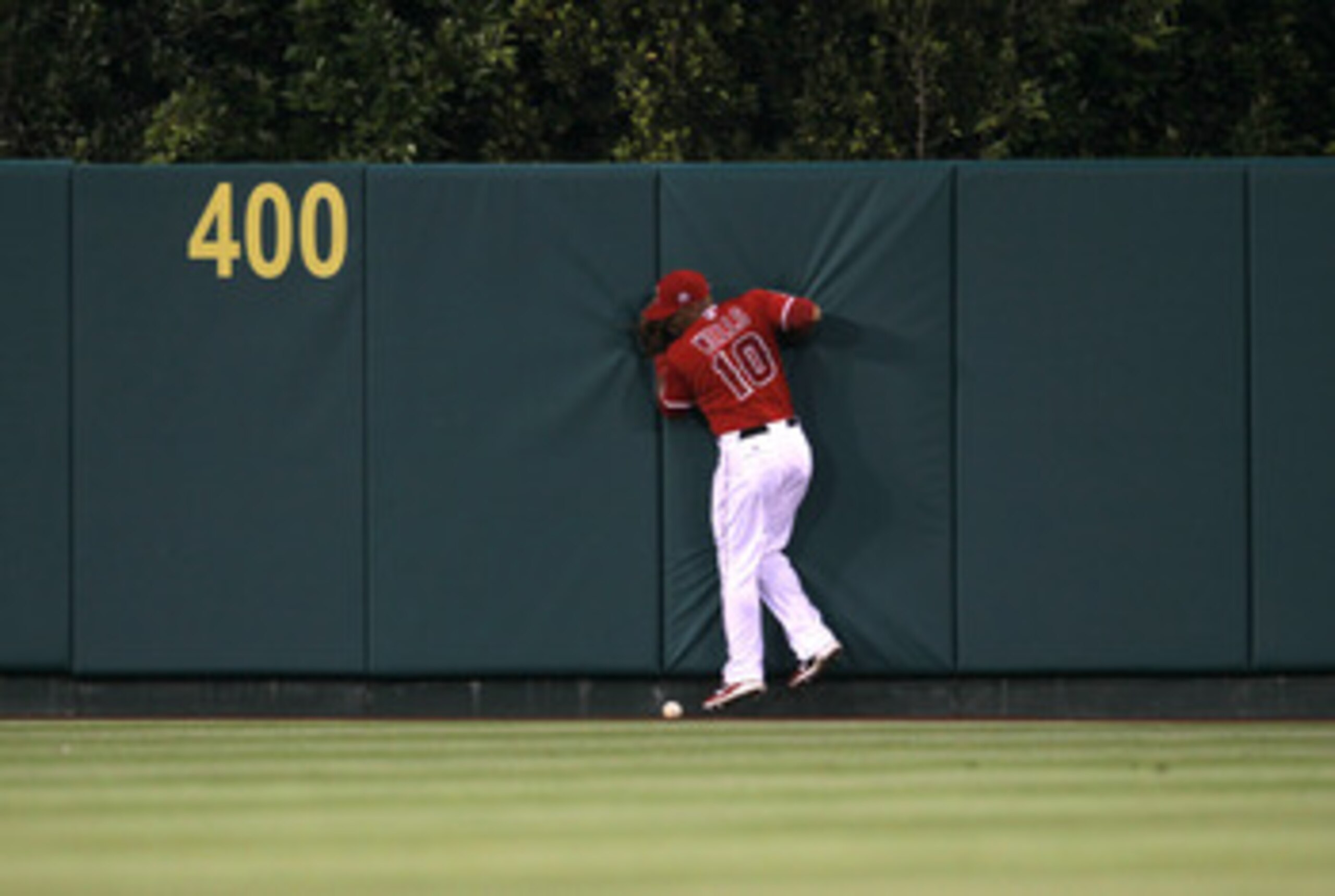 ANAHEIM, CA - JUNE 7:  Center fielder Vernon Wells #10 of the Los Angeles Angels of Anaheim can't catch an RBI double hit by Johnny Damon of the Tampa Bay Rays in the fourth inning on June 7, 2011 at Angel Stadium in Anaheim, California.  (Photo by Stephe