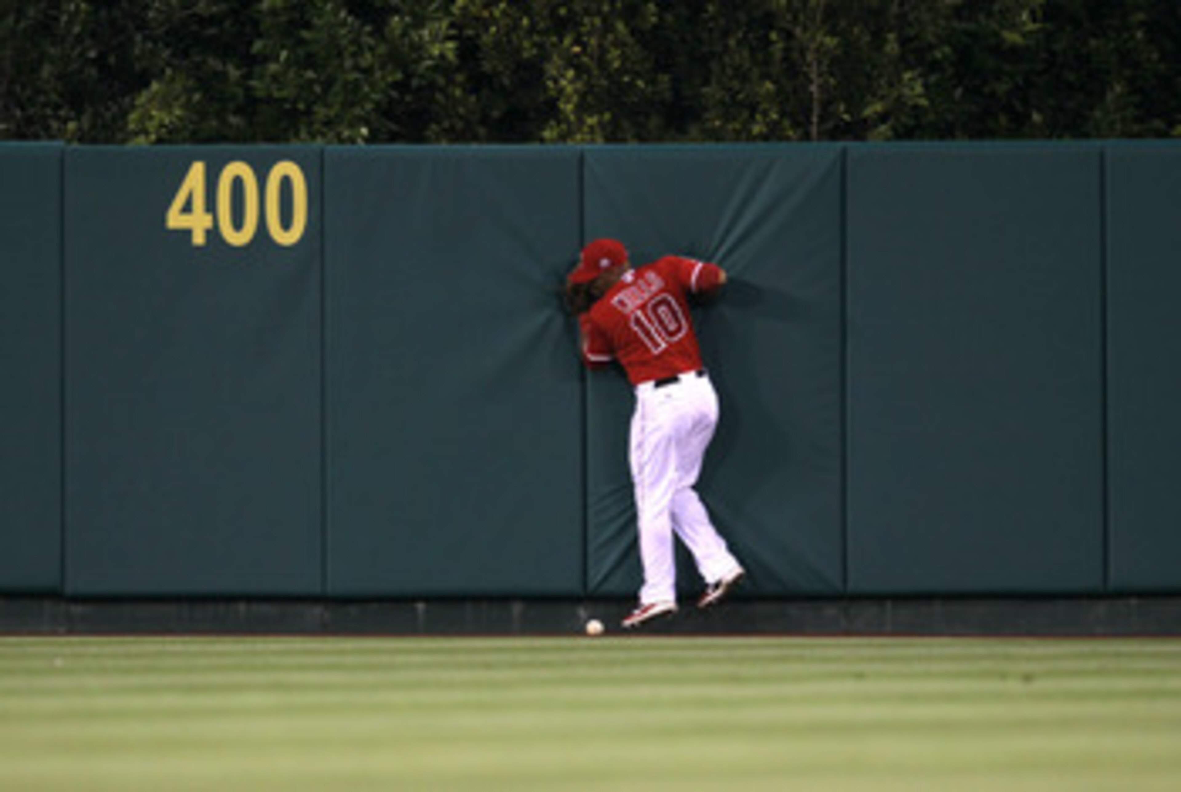 ANAHEIM, CA - JUNE 7:  Center fielder Vernon Wells #10 of the Los Angeles Angels of Anaheim can't catch an RBI double hit by Johnny Damon of the Tampa Bay Rays in the fourth inning on June 7, 2011 at Angel Stadium in Anaheim, California.  (Photo by Stephe