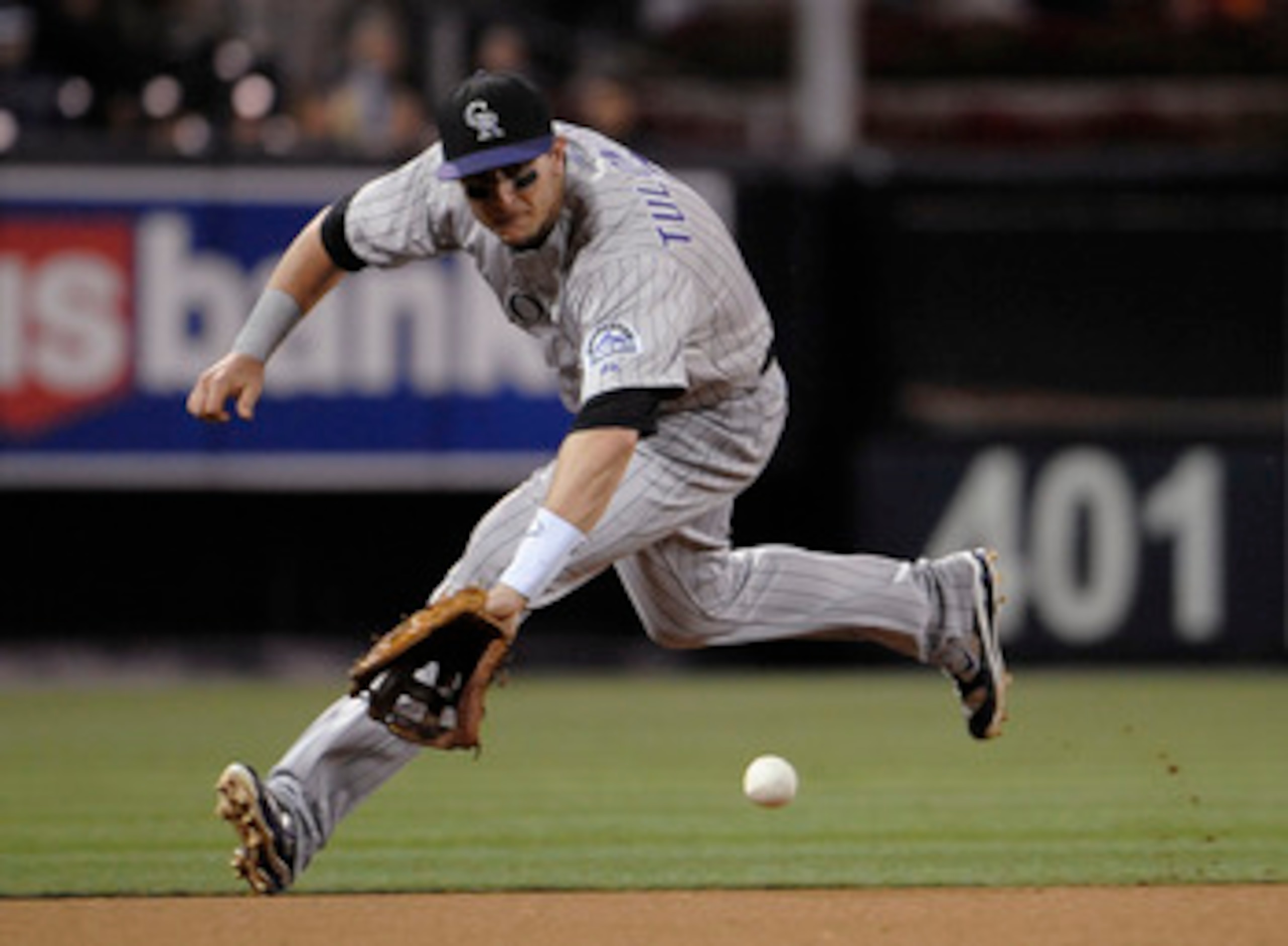 SAN DIEGO, CA - JUNE 6: Troy Tulowitzki #2 of the Colorado Rockies makes the stop on a ground ball hit by Jorge Cantu #3 of the San Diego Padres during the sixth inning of a baseball game Petco Park on June 6, 2011 in San Diego, California.  Tulowitzki go