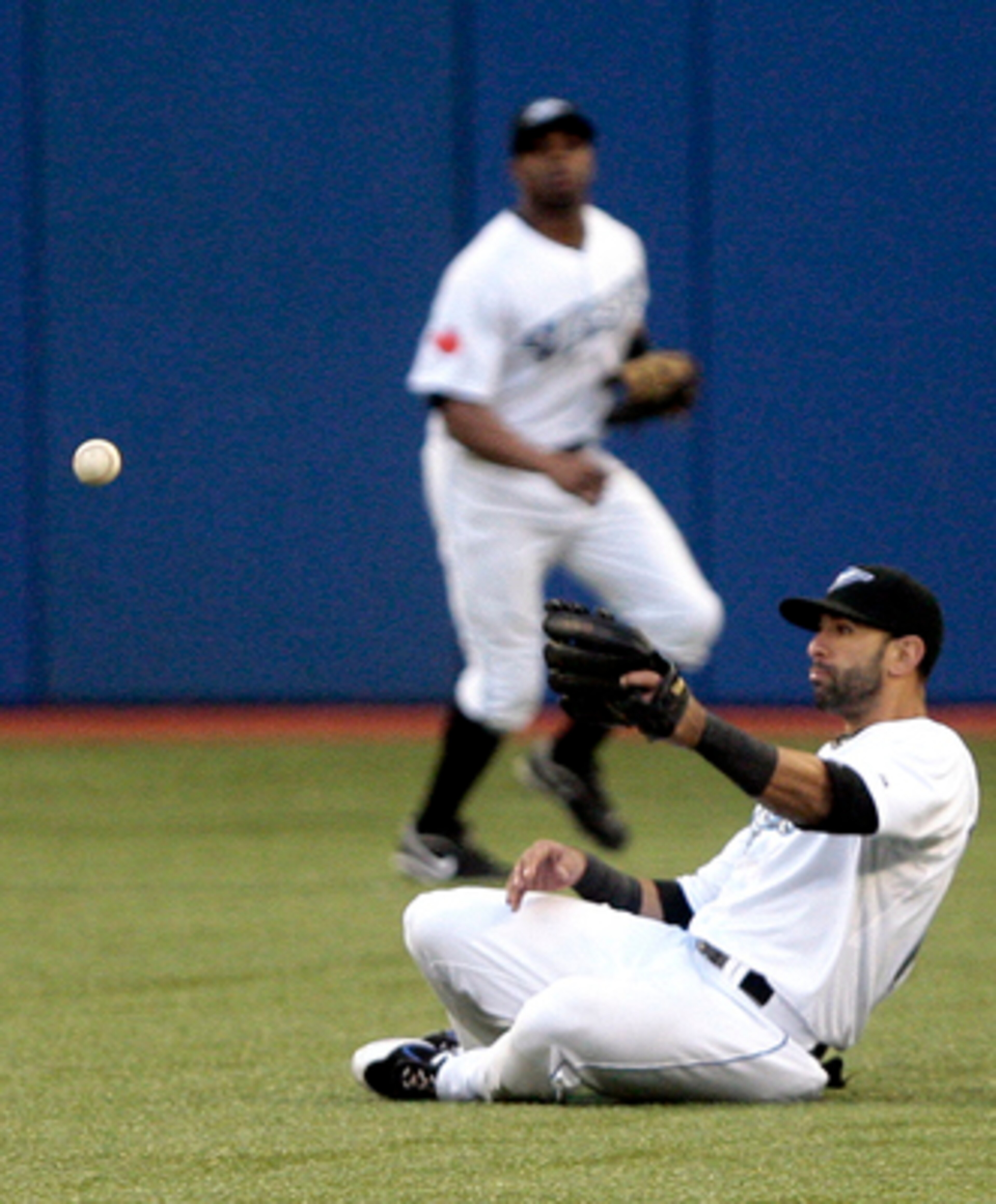 TORONTO, CANADA - JUNE 10: Jose Bautista #19 of the Toronto Blue Jays misses a fly ball during MLB action against the Boston Red Sox at The Rogers Centre June 10, 2011 in Toronto, Ontario, Canada. (Photo by Abelimages/Getty Images)