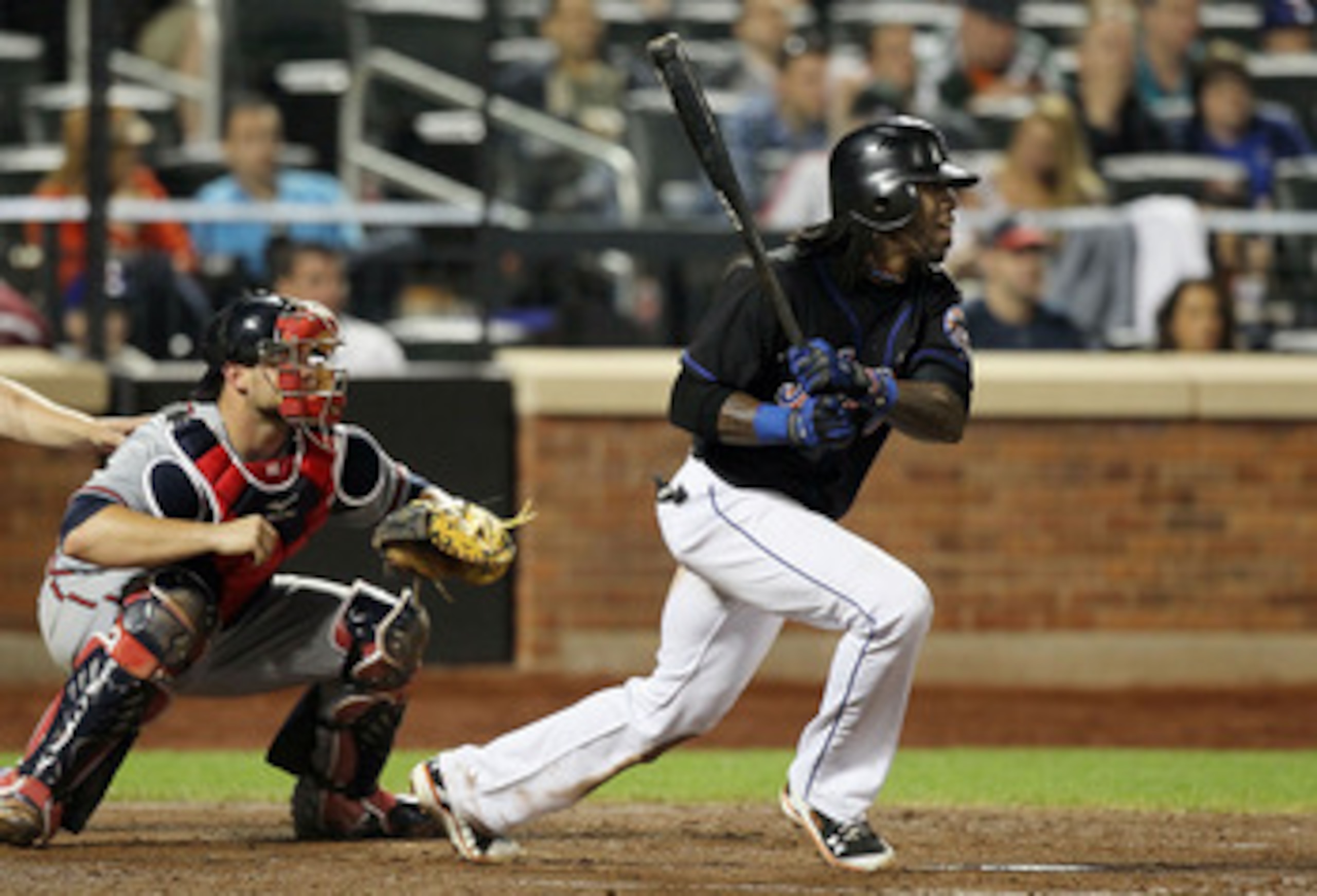NEW YORK, NY - JUNE 05:  Jose Reyes #7 of the New York Mets follows through on his fourth inning RBI double against the Atlanta Braves on June 5, 2011 at Citi Field in the Flushing neighborhood of the Queens borough of New York City.  (Photo by Jim McIsaa