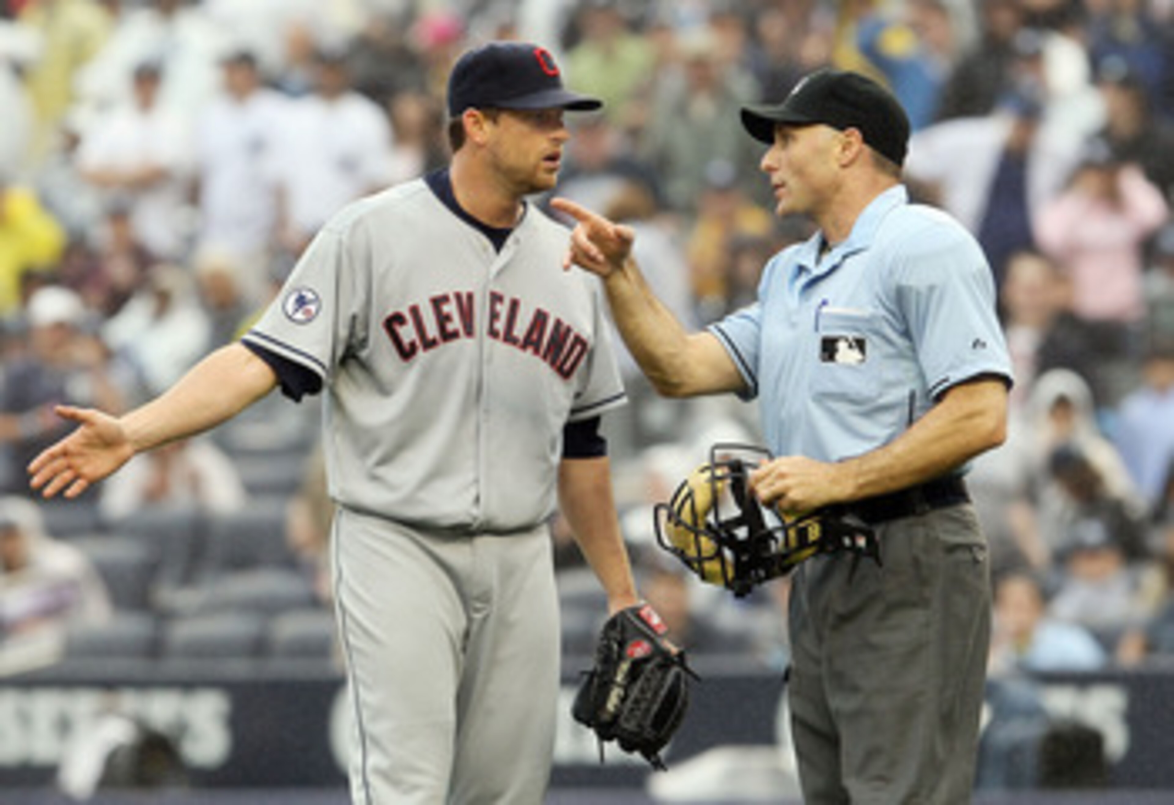 NEW YORK, NY - JUNE 11:  Mitch Talbot #51 of the Cleveland Indians argues with home plate umpire Dan Iassogna after being thrown out of the game in the sixth inning after hitting Alex Rodriguez (not pictured) of the New York Yankees with a pitch on June 1