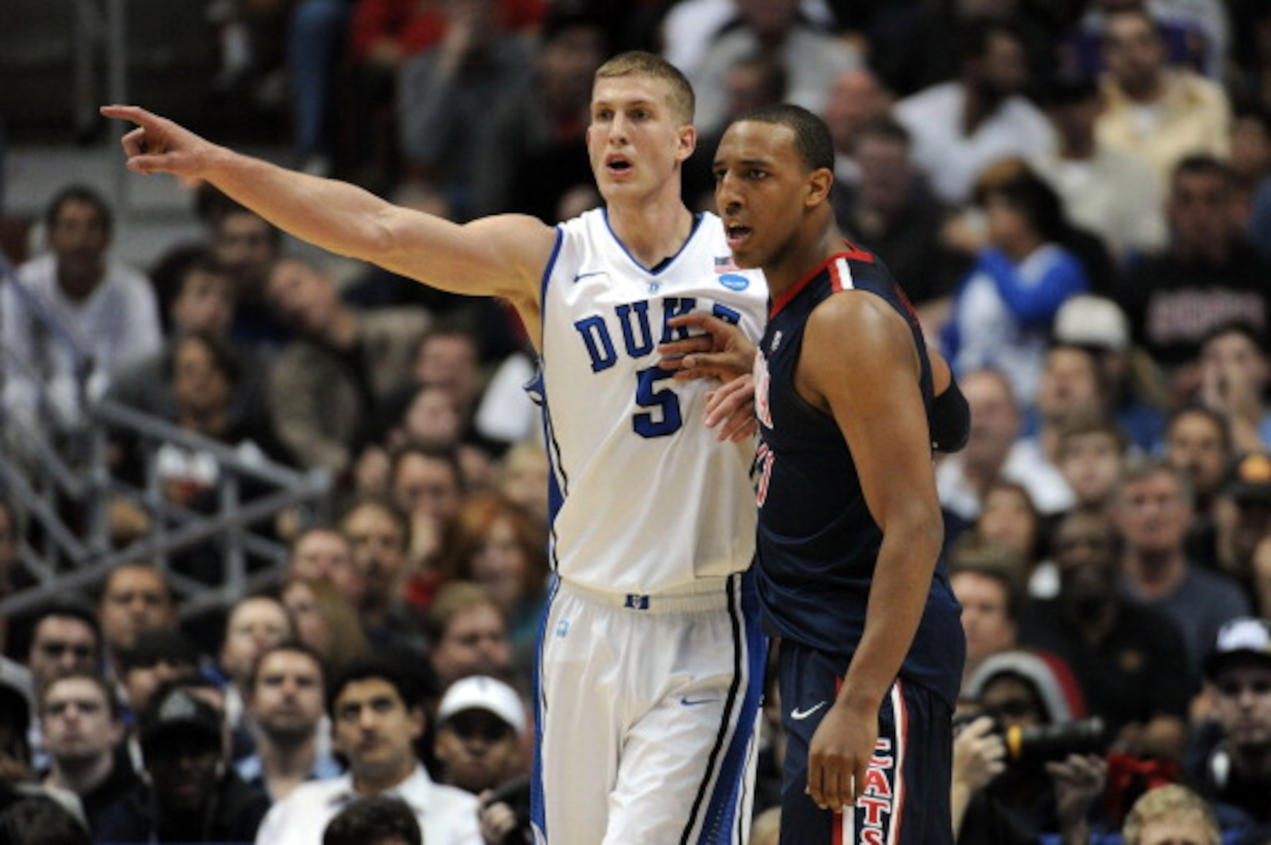 ANAHEIM, CA - MARCH 24: Mason Plumlee #5 of the Duke Blue Devils figths for position against Derrick Williams #23 of the Arizona Wildcats during the west regional semifinal of the 2011 NCAA men's basketball tournament at the Honda Center on March 24, 201 ANAHEIM, CA - MARCH 24: Mason Plumlee #5 of the Duke Blue Devils figths for position against Derrick Williams #23 of the Arizona Wildcats during the west regional semifinal of the 2011 NCAA men's basketball tournament at the Honda Center on March 24, 201
